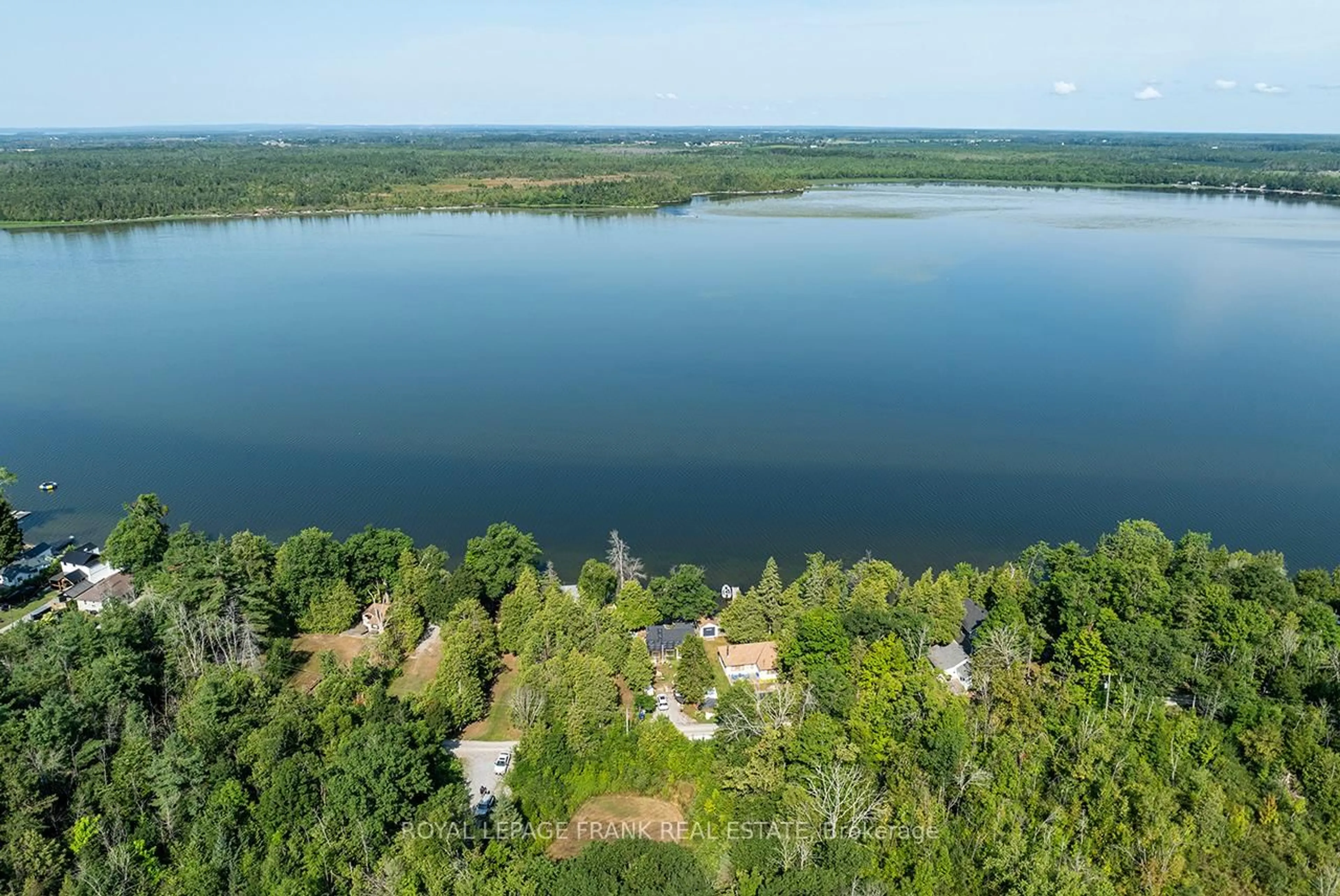 A pic from outside/outdoor area/front of a property/back of a property/a pic from drone, water/lake/river/ocean view for 1206 Black Beach Lane, Ramara Ontario L0K 1B0