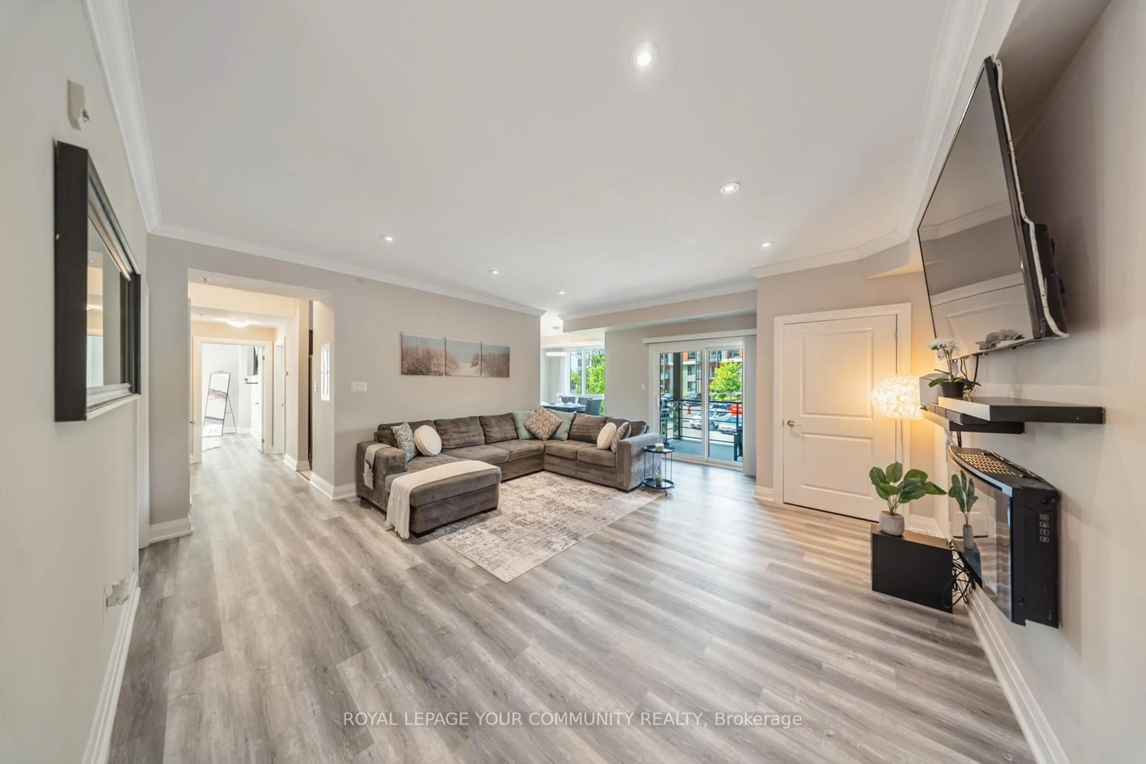 Living room with furniture, unknown for 304 Essa Rd #113, Barrie Ontario L9J 0H4