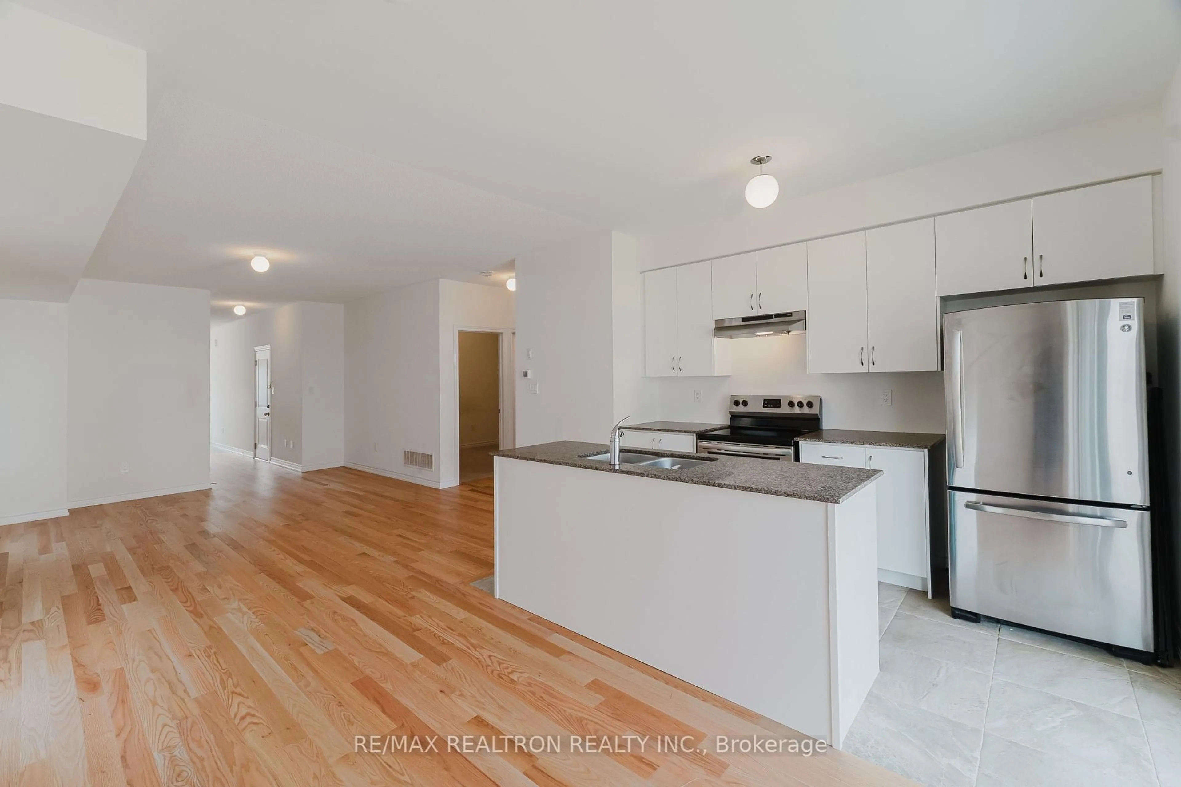 Open concept kitchen, wood/laminate floor for 12 Bannister Rd, Barrie Ontario L9J 0L4