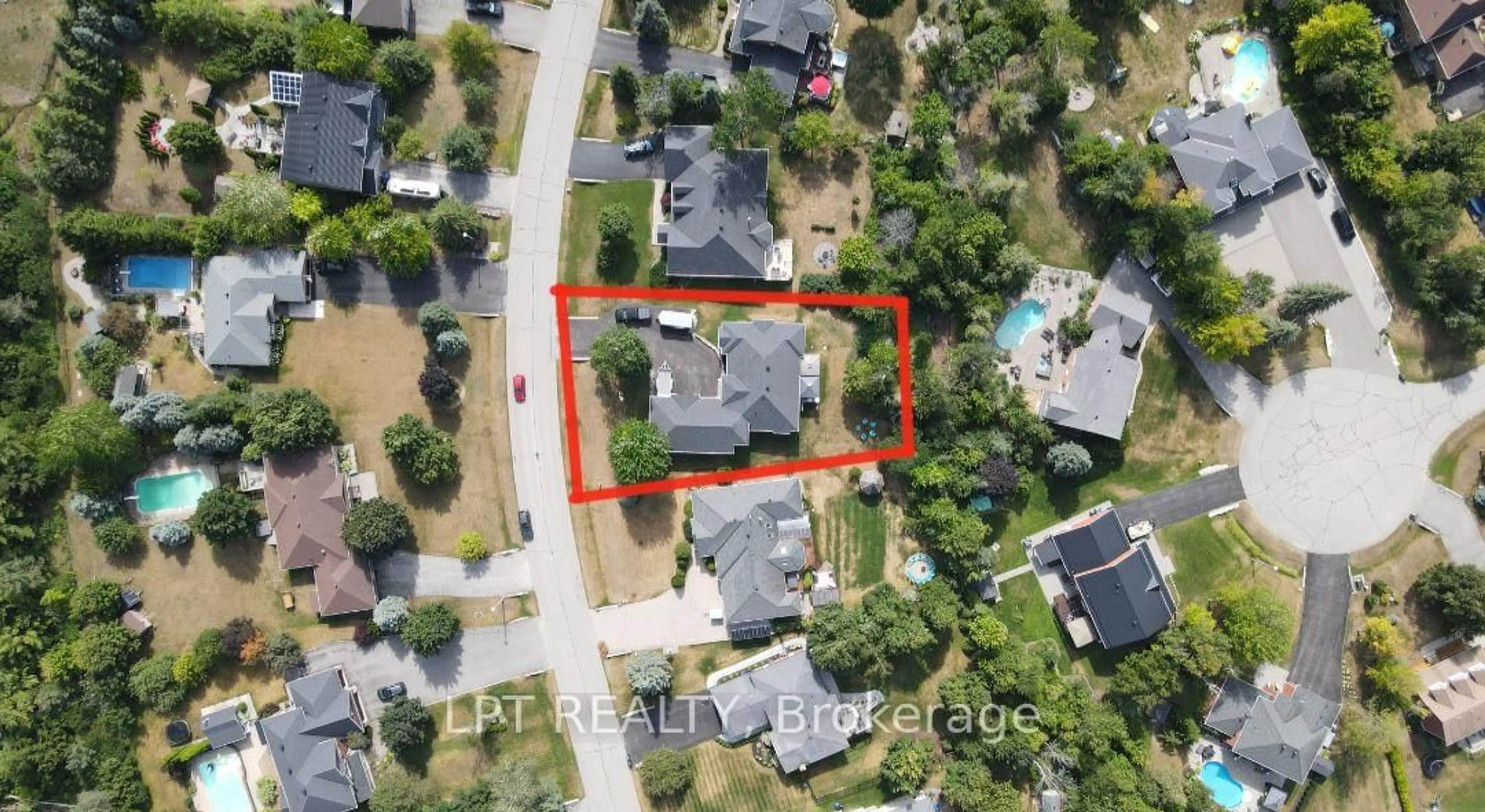 A pic from outside/outdoor area/front of a property/back of a property/a pic from drone, street for 18 Eder Tr, Springwater Ontario L0L 1Y3