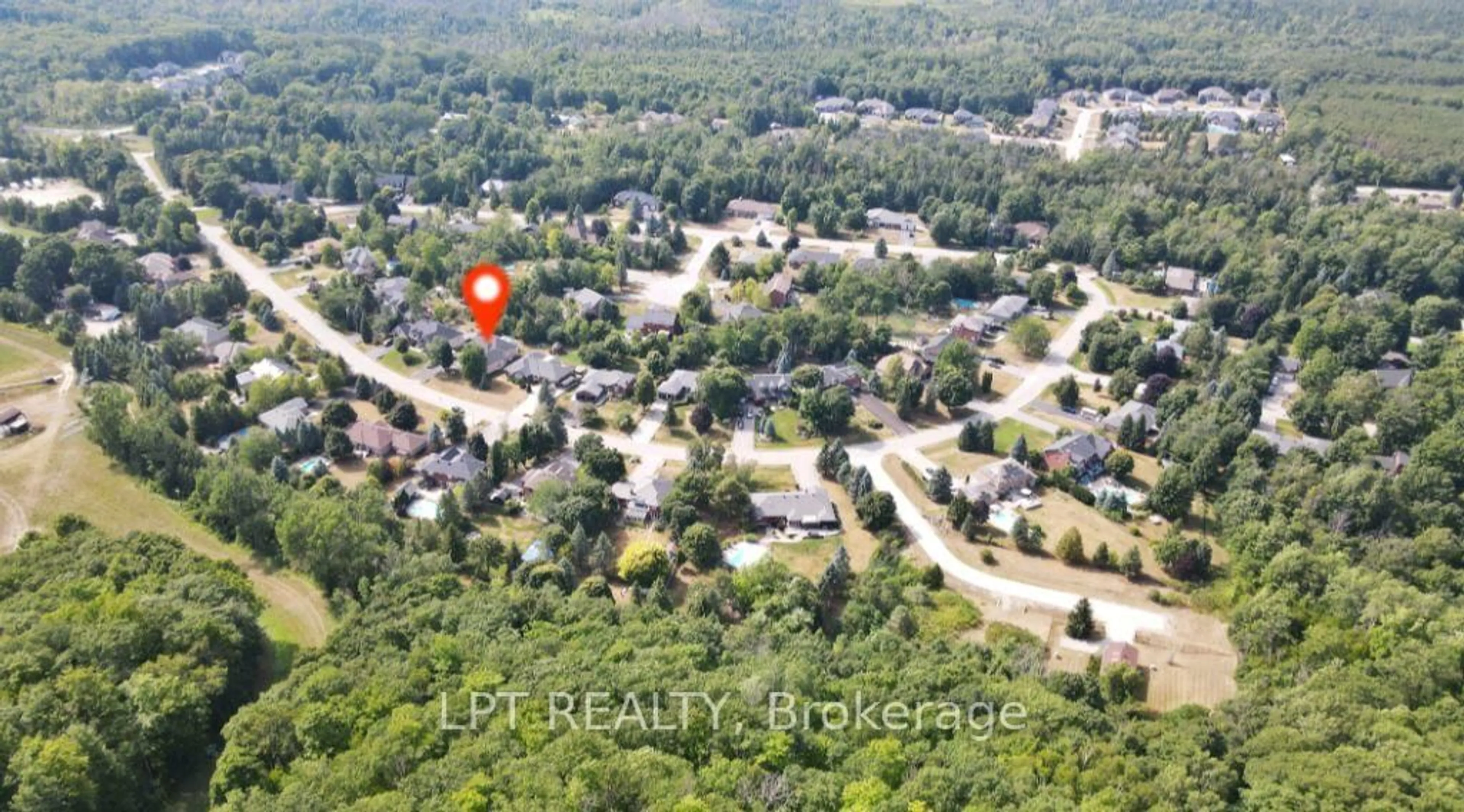 A pic from outside/outdoor area/front of a property/back of a property/a pic from drone, unknown for 18 Eder Tr, Springwater Ontario L0L 1Y3
