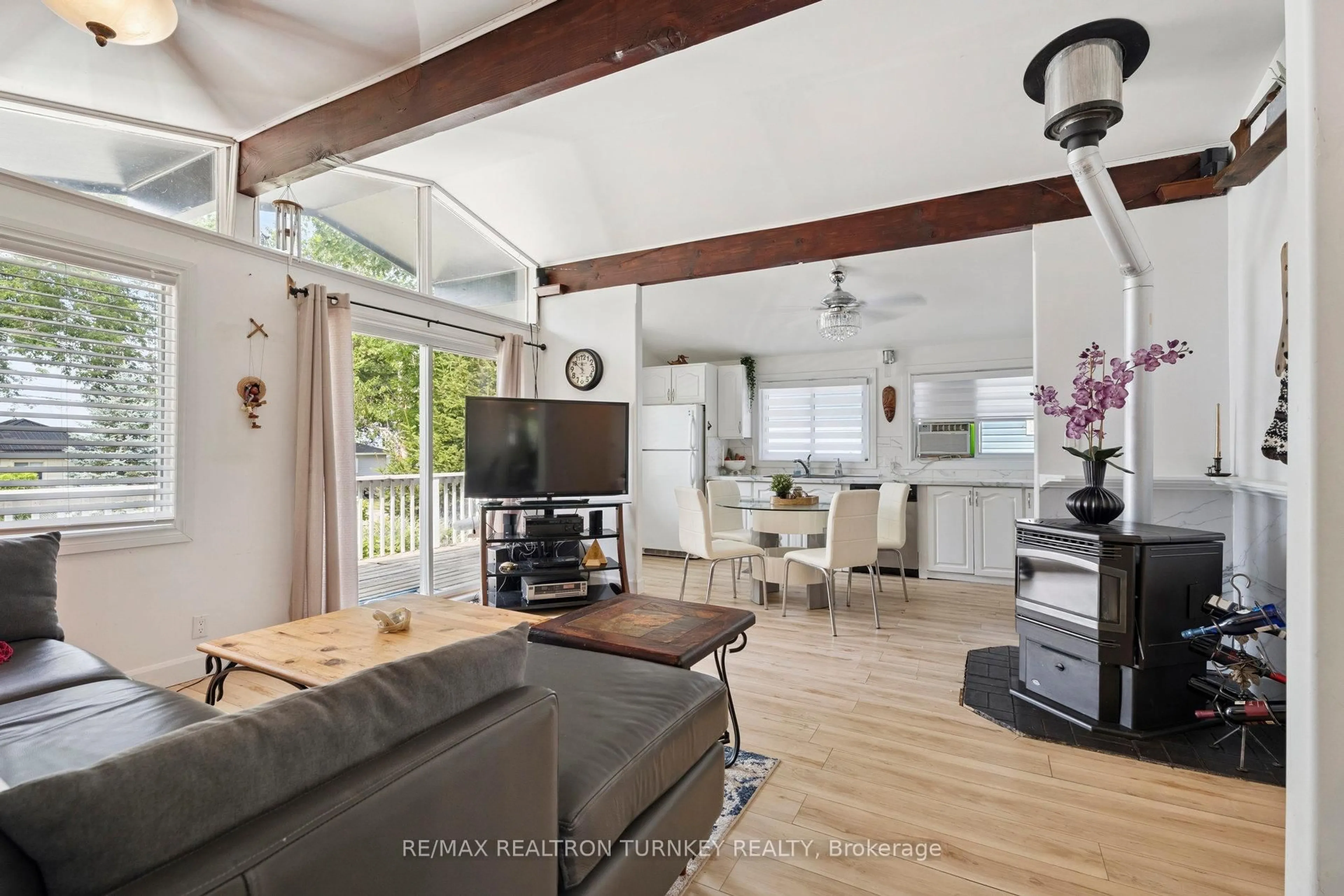 Living room with furniture, wood/laminate floor for 2727 Lone Birch Tr, Ramara Ontario L0K 1B0