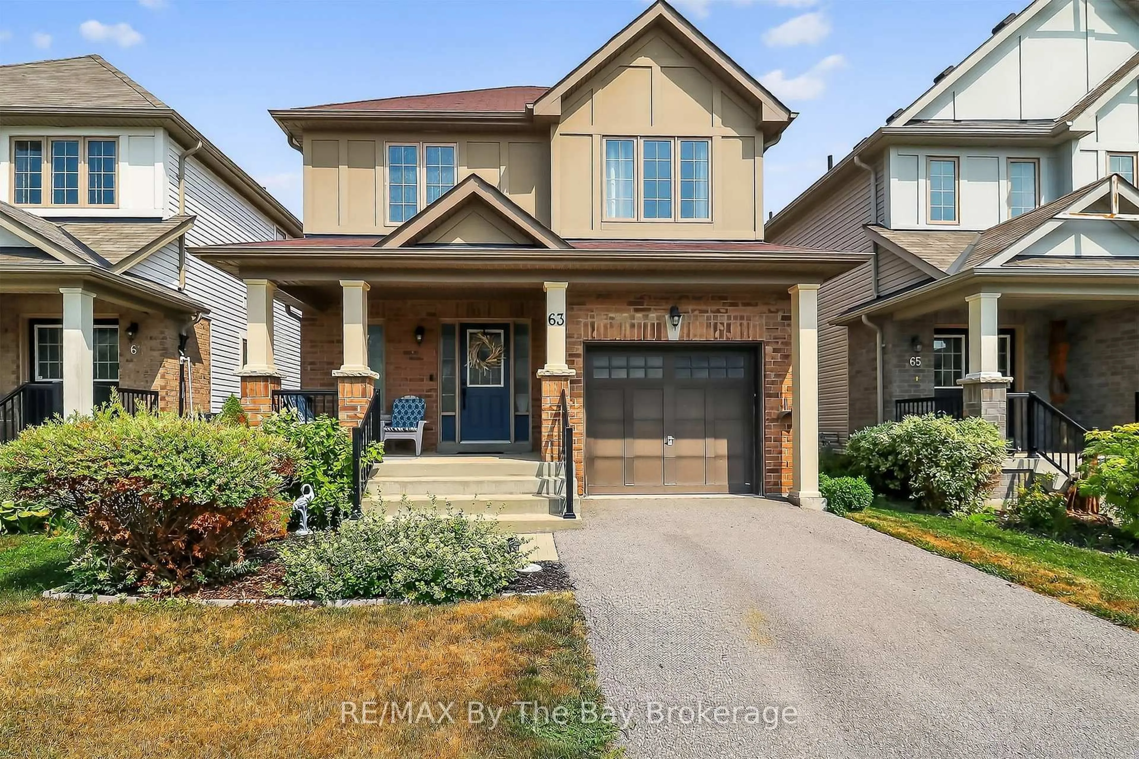 Home with brick exterior material, street for 63 Robertson St, Collingwood Ontario L9Y 0X1