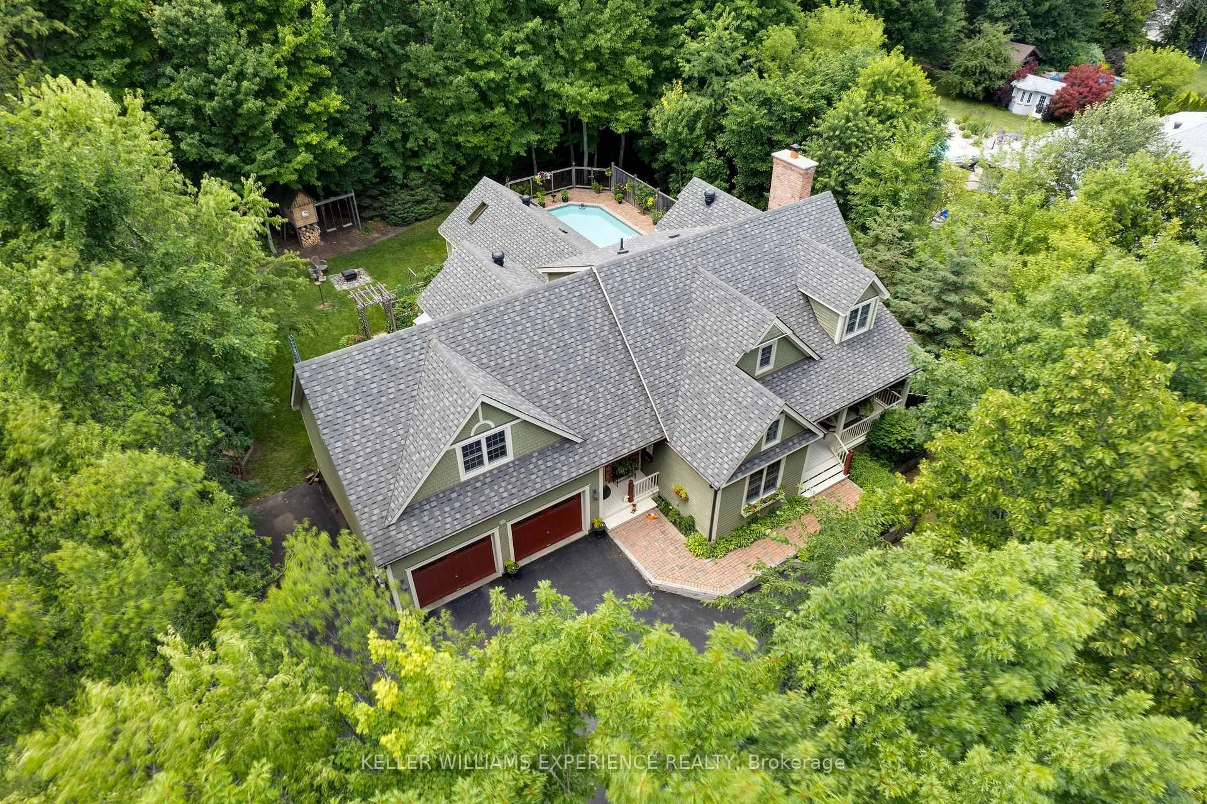 A pic from outside/outdoor area/front of a property/back of a property/a pic from drone, unknown for 26 Paddy Dunn's Circ, Springwater Ontario L9X 0T1