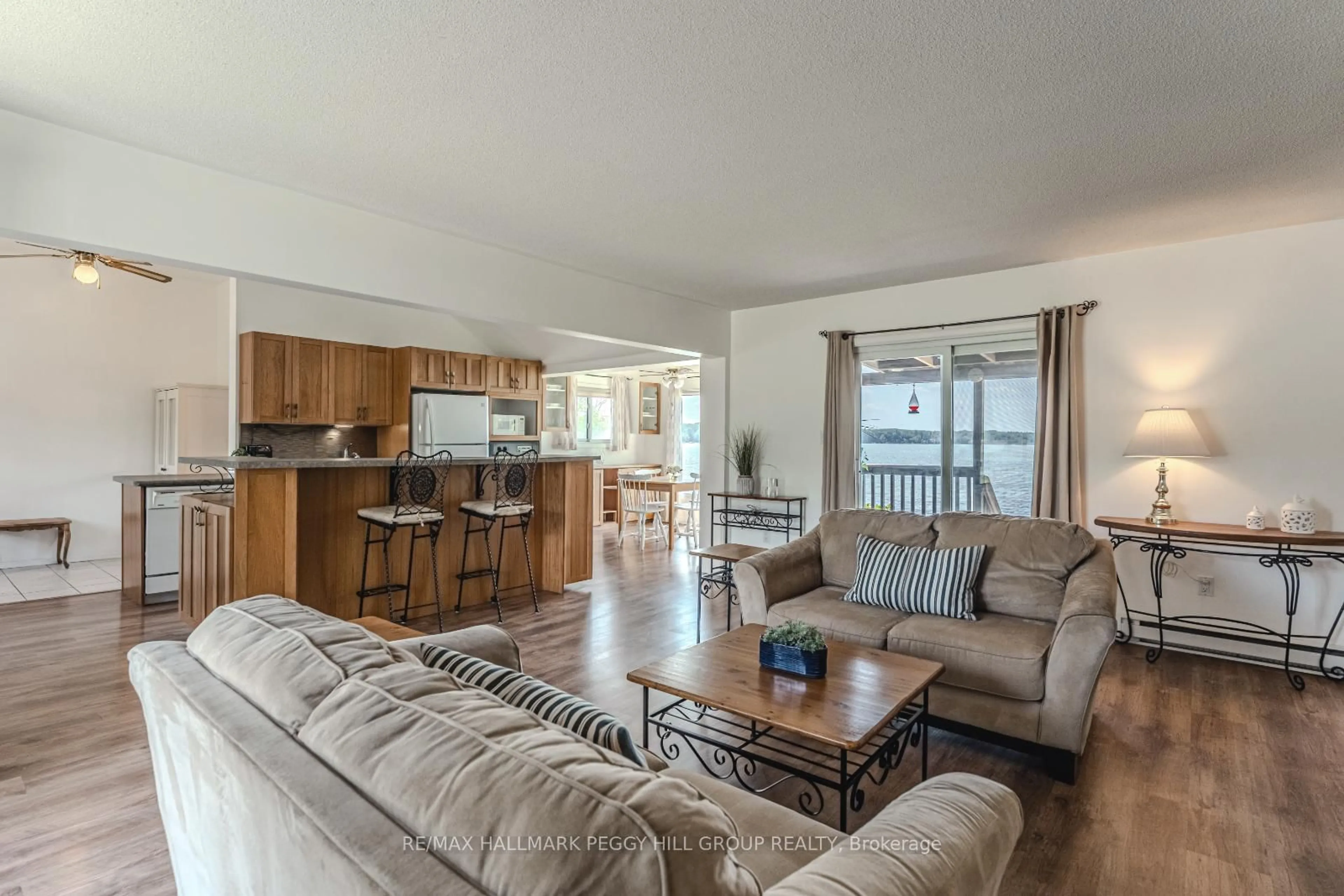 Living room with furniture, unknown for 5580 Penetanguishene Rd, Springwater Ontario L0L 1P0