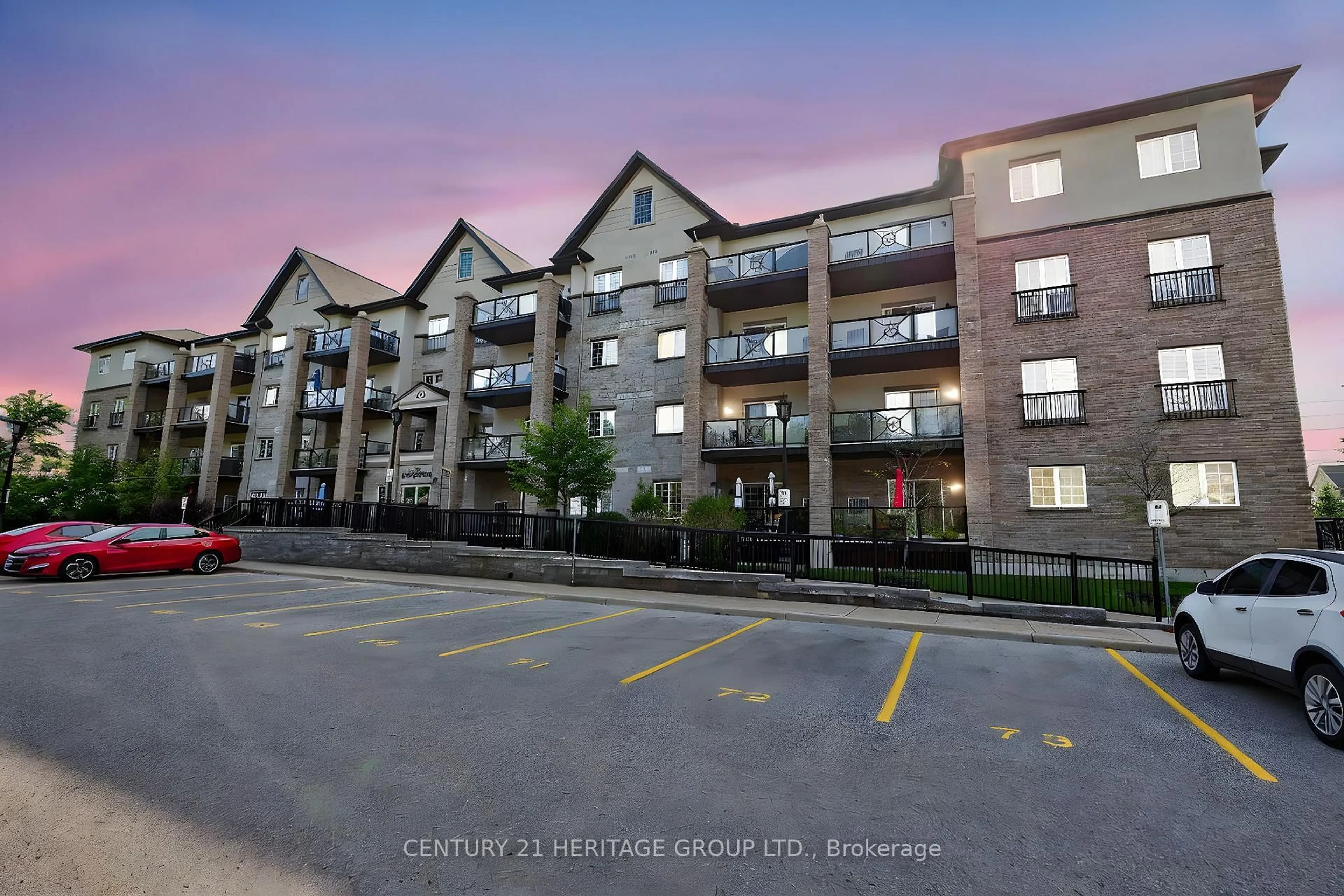 A pic from outside/outdoor area/front of a property/back of a property/a pic from drone, street for 40 Ferndale Dr #206, Barrie Ontario L4N 2L3