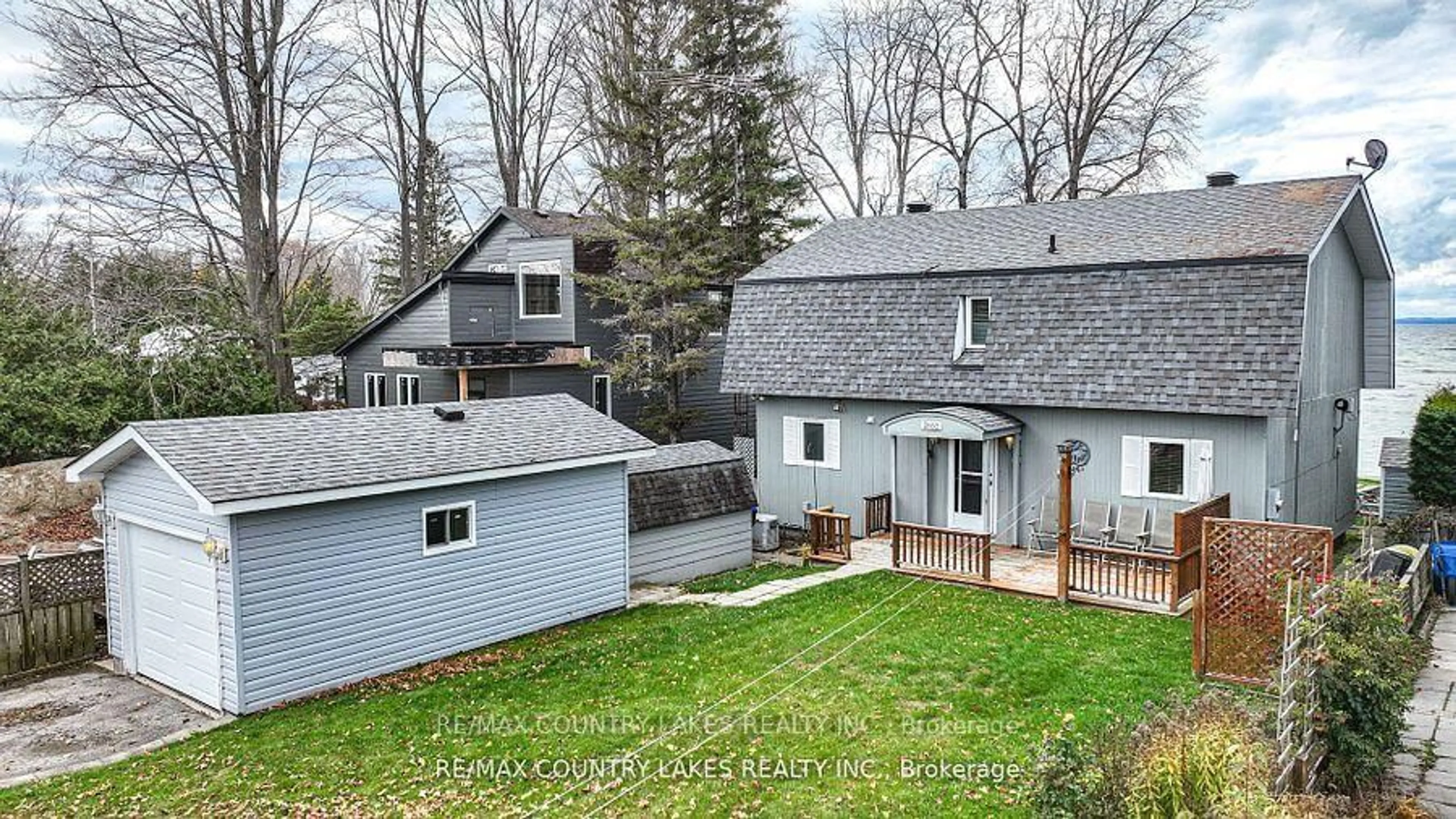 A pic from outside/outdoor area/front of a property/back of a property/a pic from drone, street for 2102 Lakeshore Dr, Ramara Ontario L0K 1B0