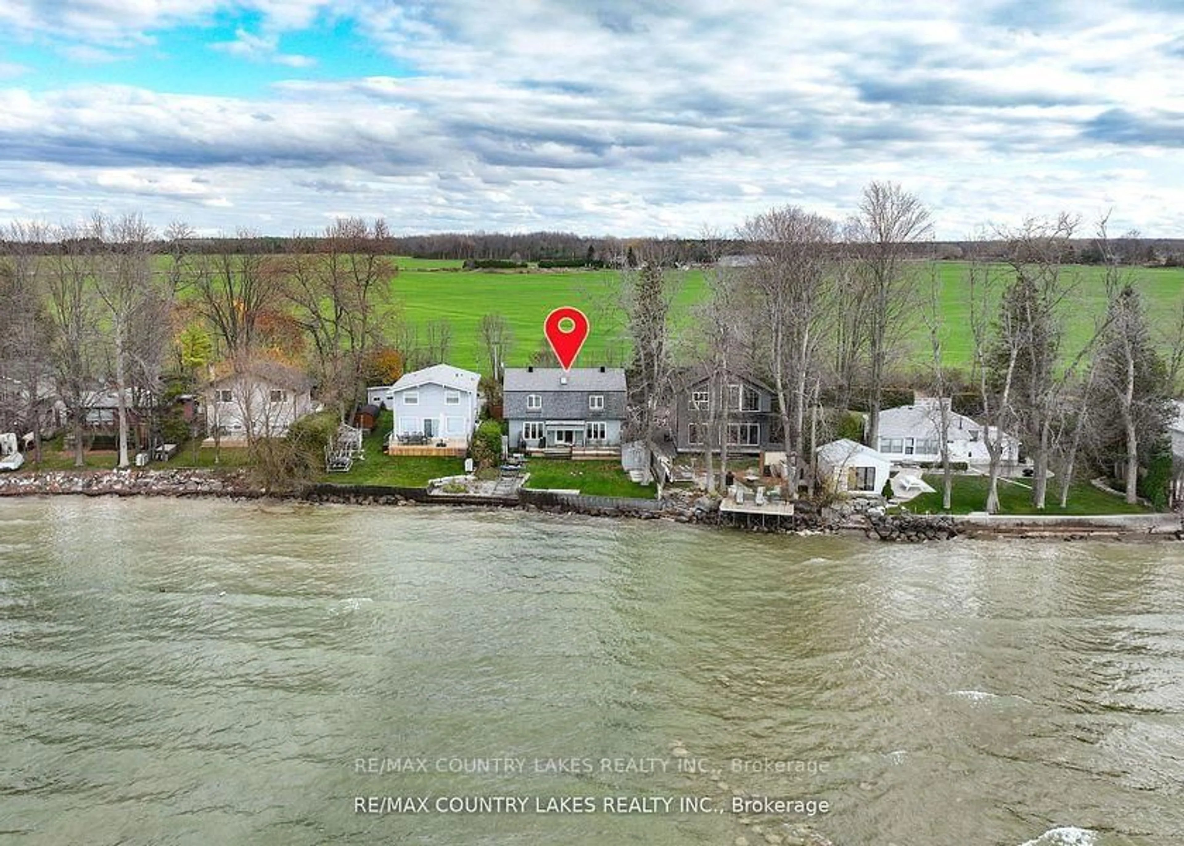 A pic from outside/outdoor area/front of a property/back of a property/a pic from drone, water/lake/river/ocean view for 2102 Lakeshore Dr, Ramara Ontario L0K 1B0