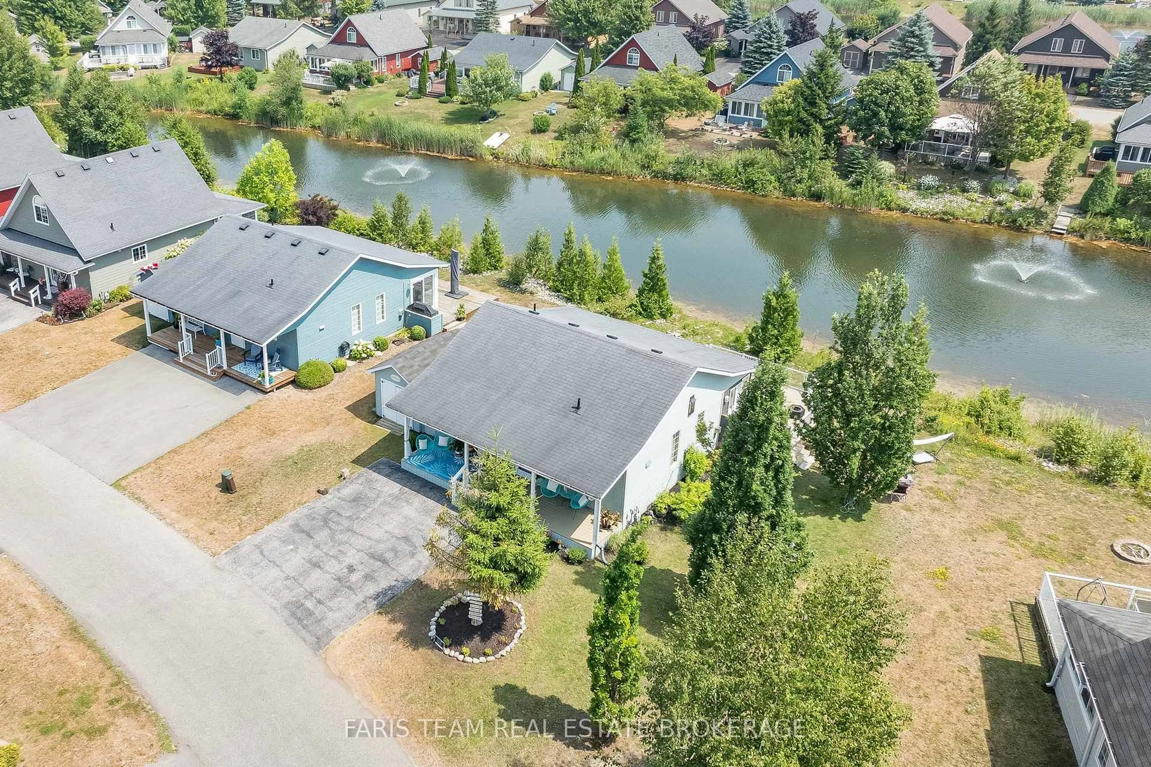 A pic from outside/outdoor area/front of a property/back of a property/a pic from drone, water/lake/river/ocean view for 3 Awenda Ave, Wasaga Beach Ontario L9Z 1X7