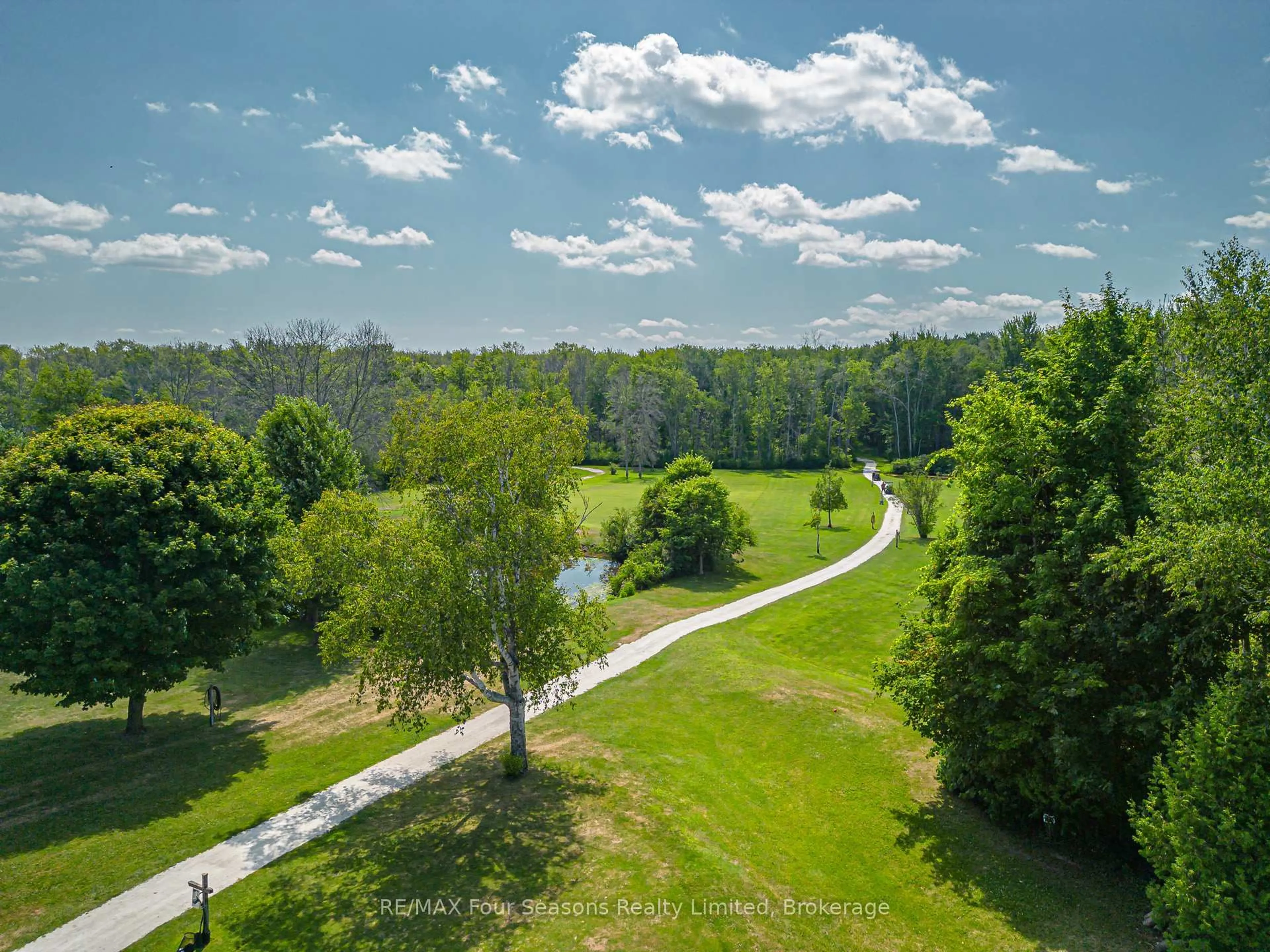 A pic from outside/outdoor area/front of a property/back of a property/a pic from drone, forest/trees view for 7 Allen Dr, Wasaga Beach Ontario L9Z 1K5