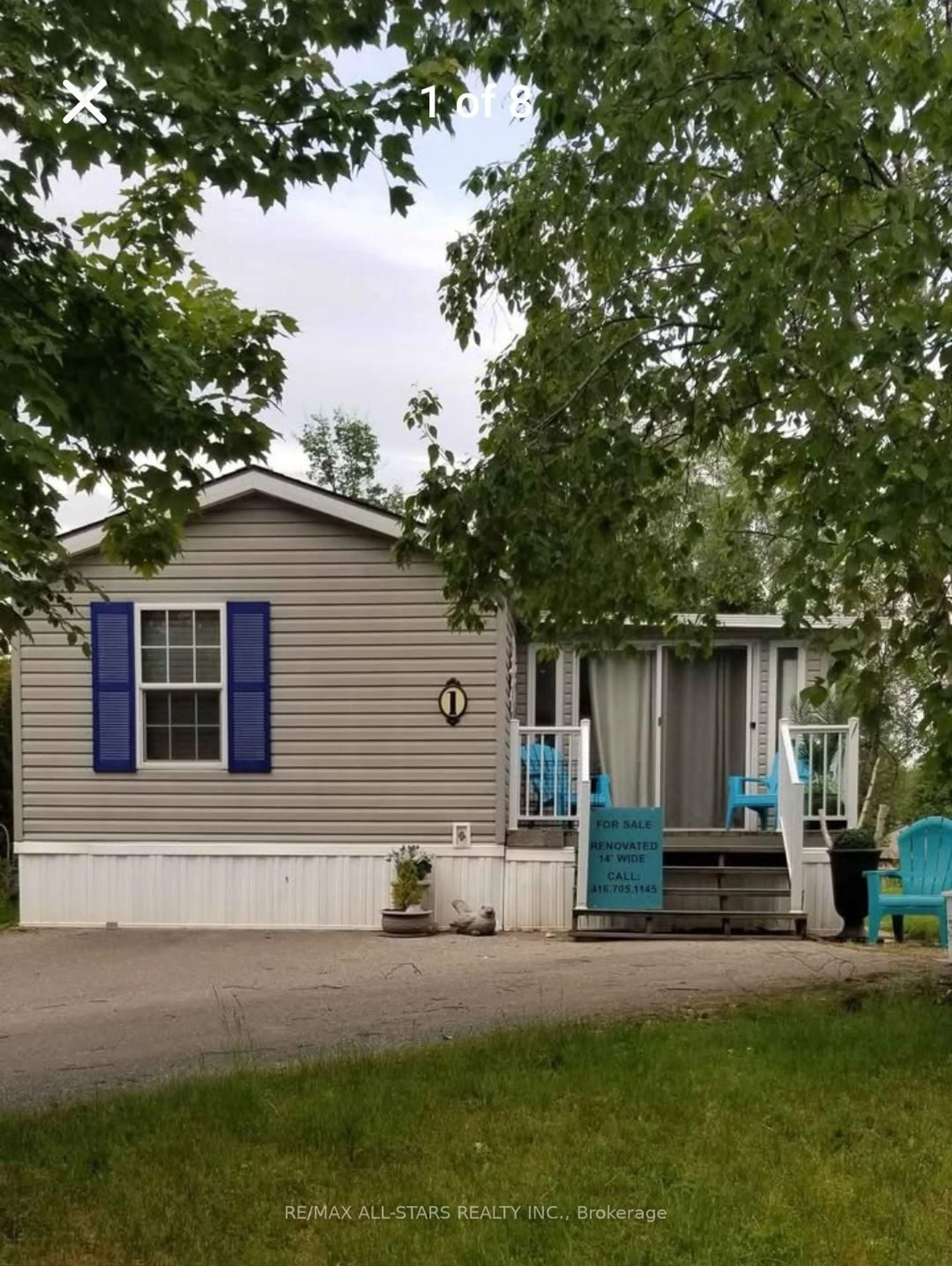 Home with vinyl exterior material, street for 1 KENORA Tr, Wasaga Beach Ontario L9Z 1X7
