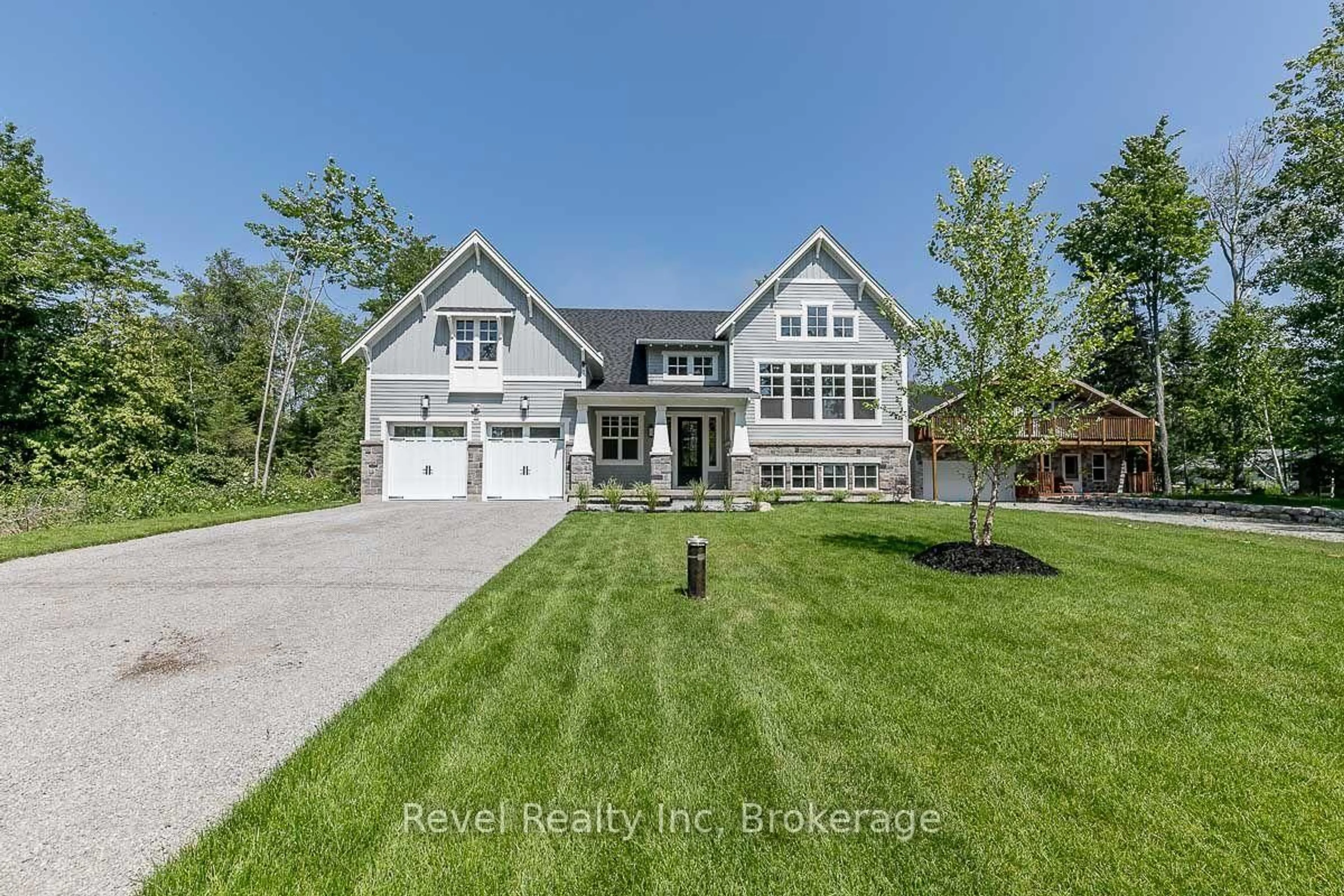 A pic from outside/outdoor area/front of a property/back of a property/a pic from drone, unknown for 1749 TINY BEACHES Rd, Tiny Ontario L0L 1P0