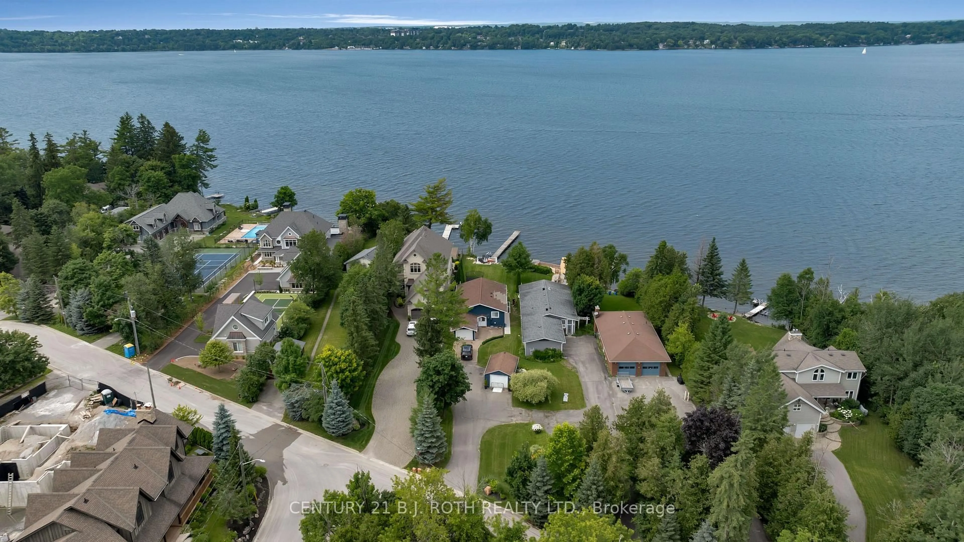 A pic from outside/outdoor area/front of a property/back of a property/a pic from drone, water/lake/river/ocean view for 56 Gray Lane, Barrie Ontario L4N 7T1