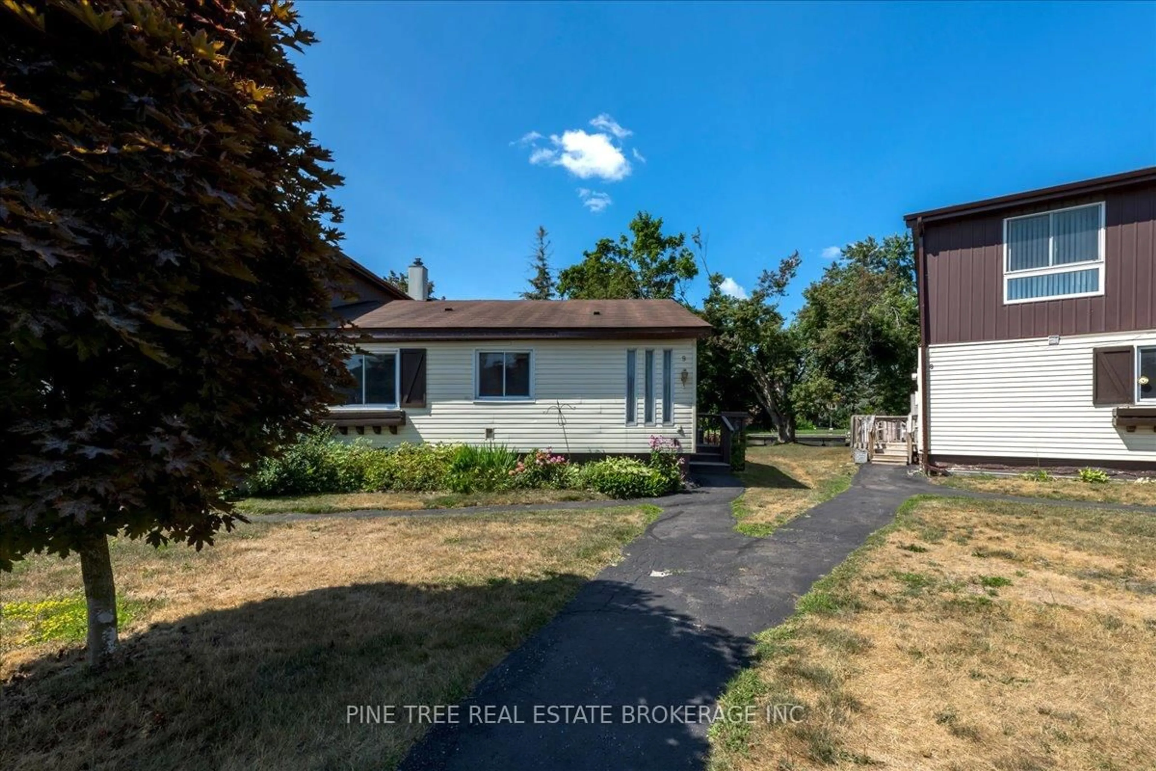 A pic from outside/outdoor area/front of a property/back of a property/a pic from drone, street for 70 Laguna Pkwy #9, Ramara Ontario L0K 1B0
