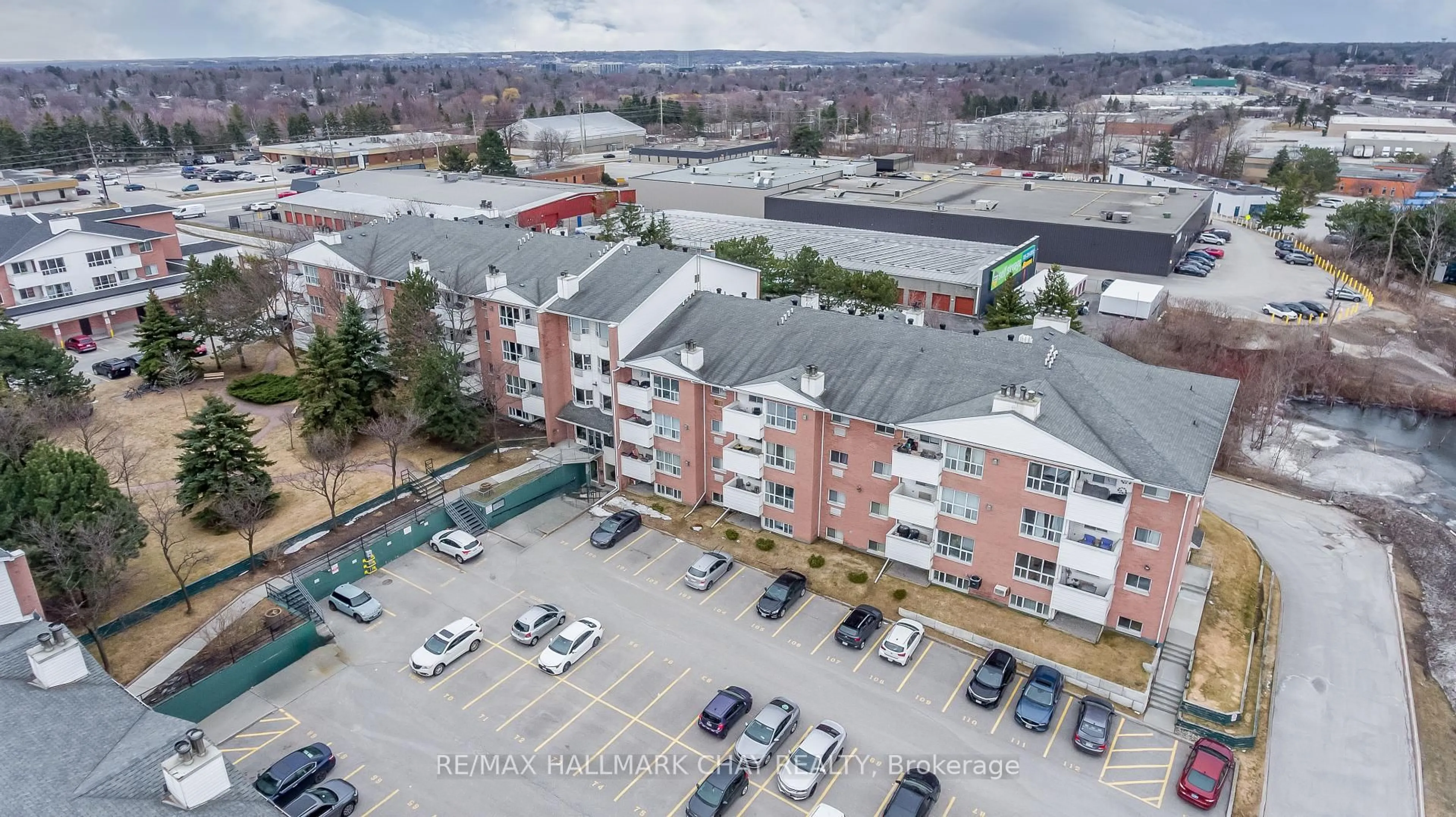 A pic from outside/outdoor area/front of a property/back of a property/a pic from drone, city buildings view from balcony for 120 Bell Farm Rd #216, Barrie Ontario L4M 6J2