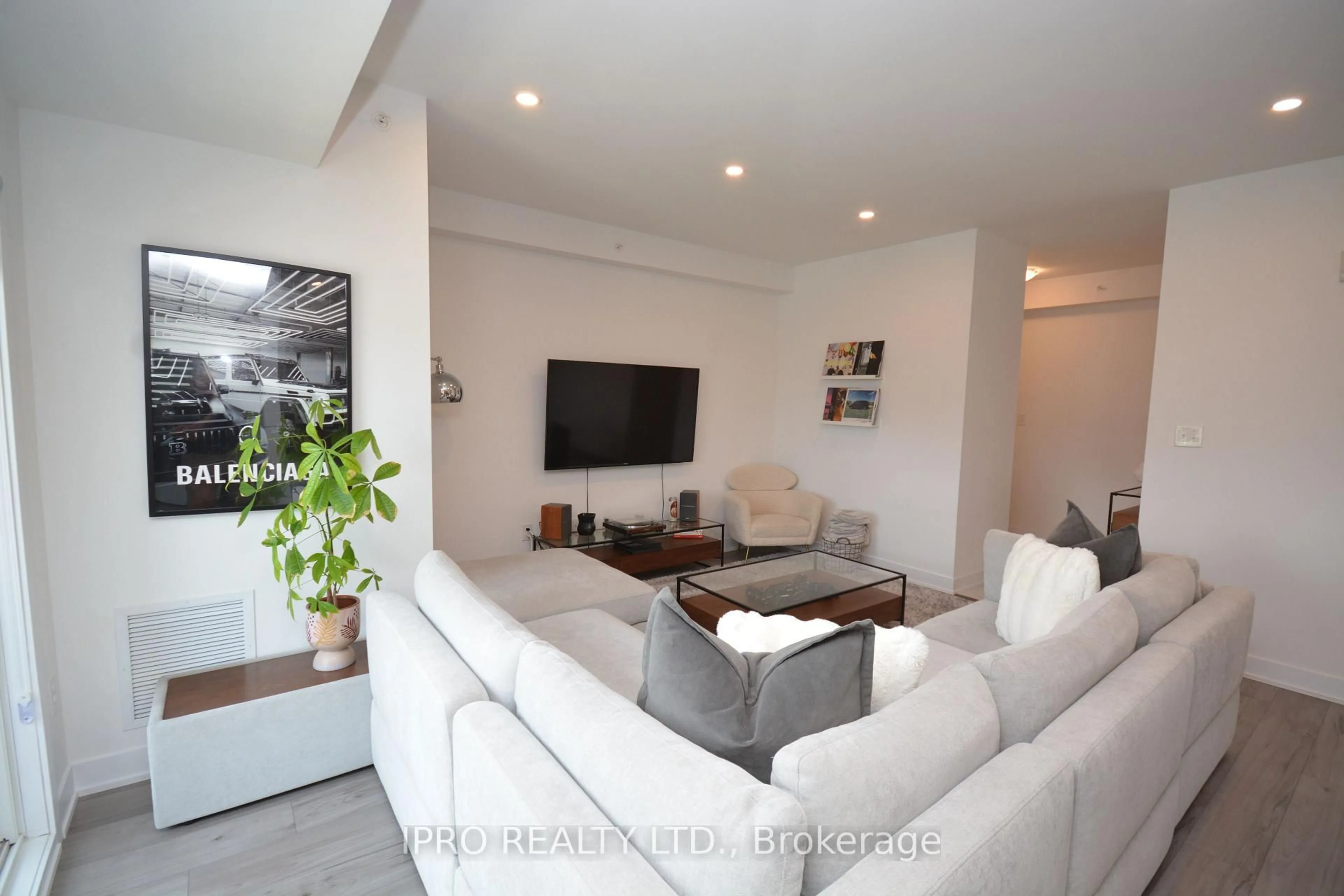Living room with furniture, unknown for 8 Culinary Lane #411, Barrie Ontario L9J 0T2