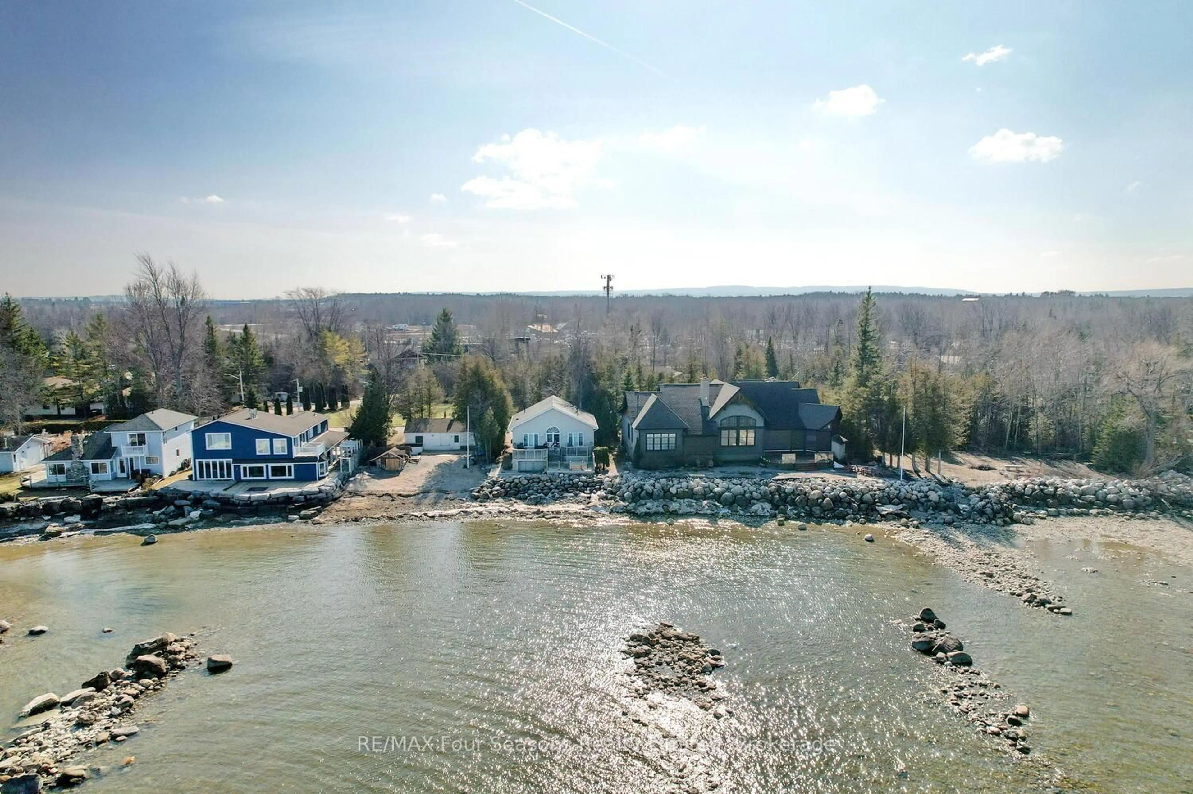 A pic from outside/outdoor area/front of a property/back of a property/a pic from drone, water/lake/river/ocean view for 46 William Ave, Wasaga Beach Ontario L9Z 2X3