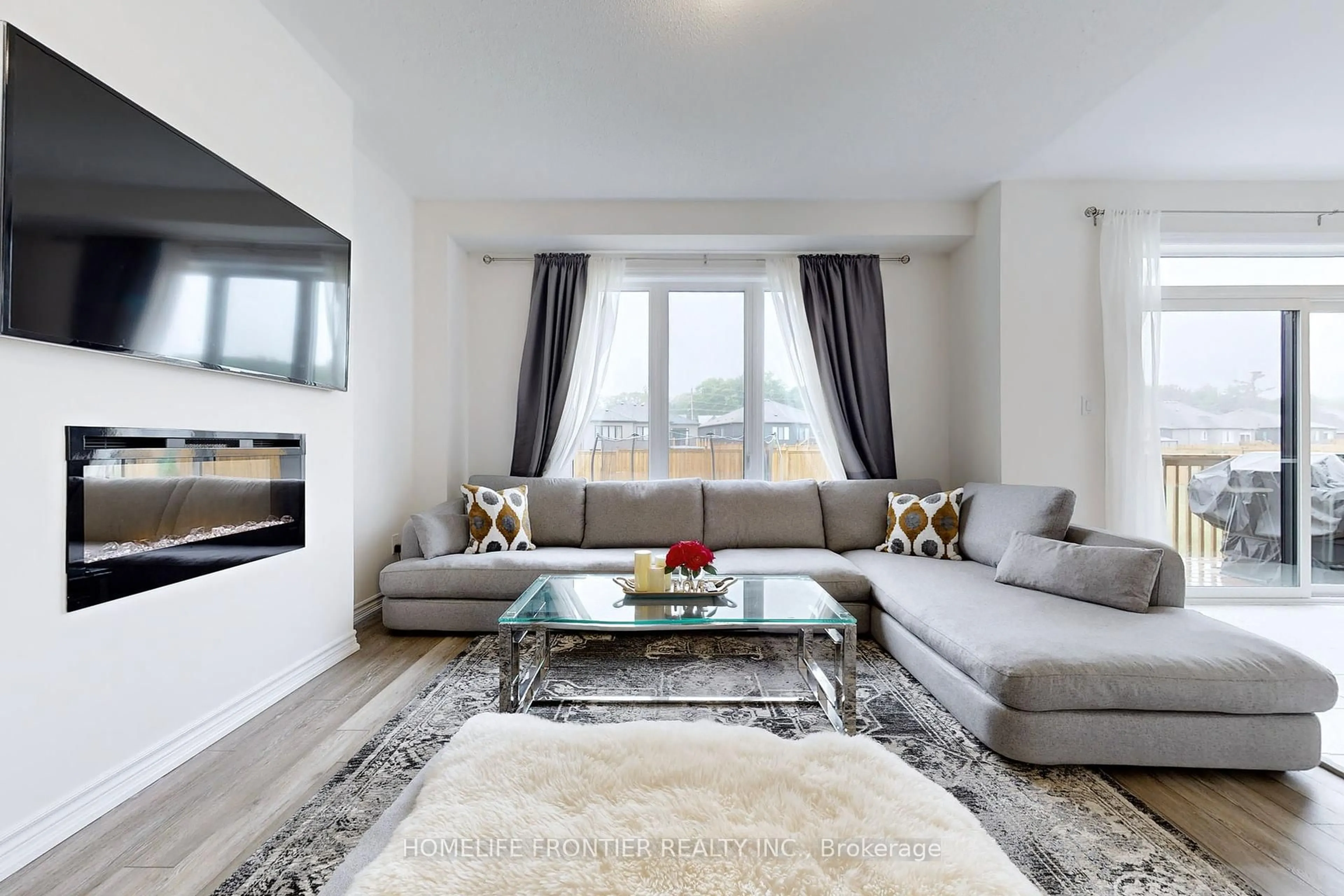 Living room with furniture, unknown for 33 Simona Ave, Wasaga Beach Ontario L9Z 0L5