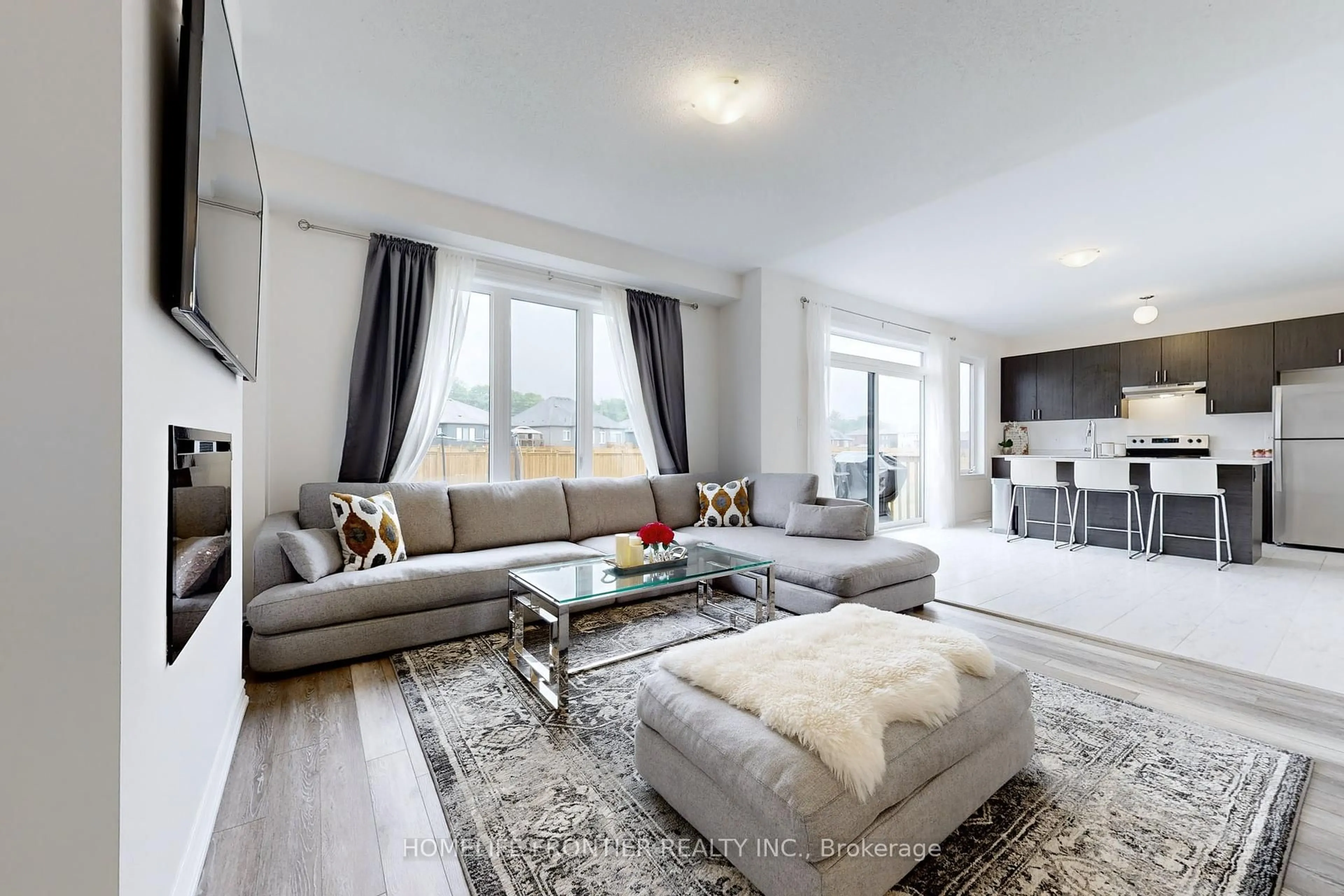 Living room with furniture, unknown for 33 Simona Ave, Wasaga Beach Ontario L9Z 0L5