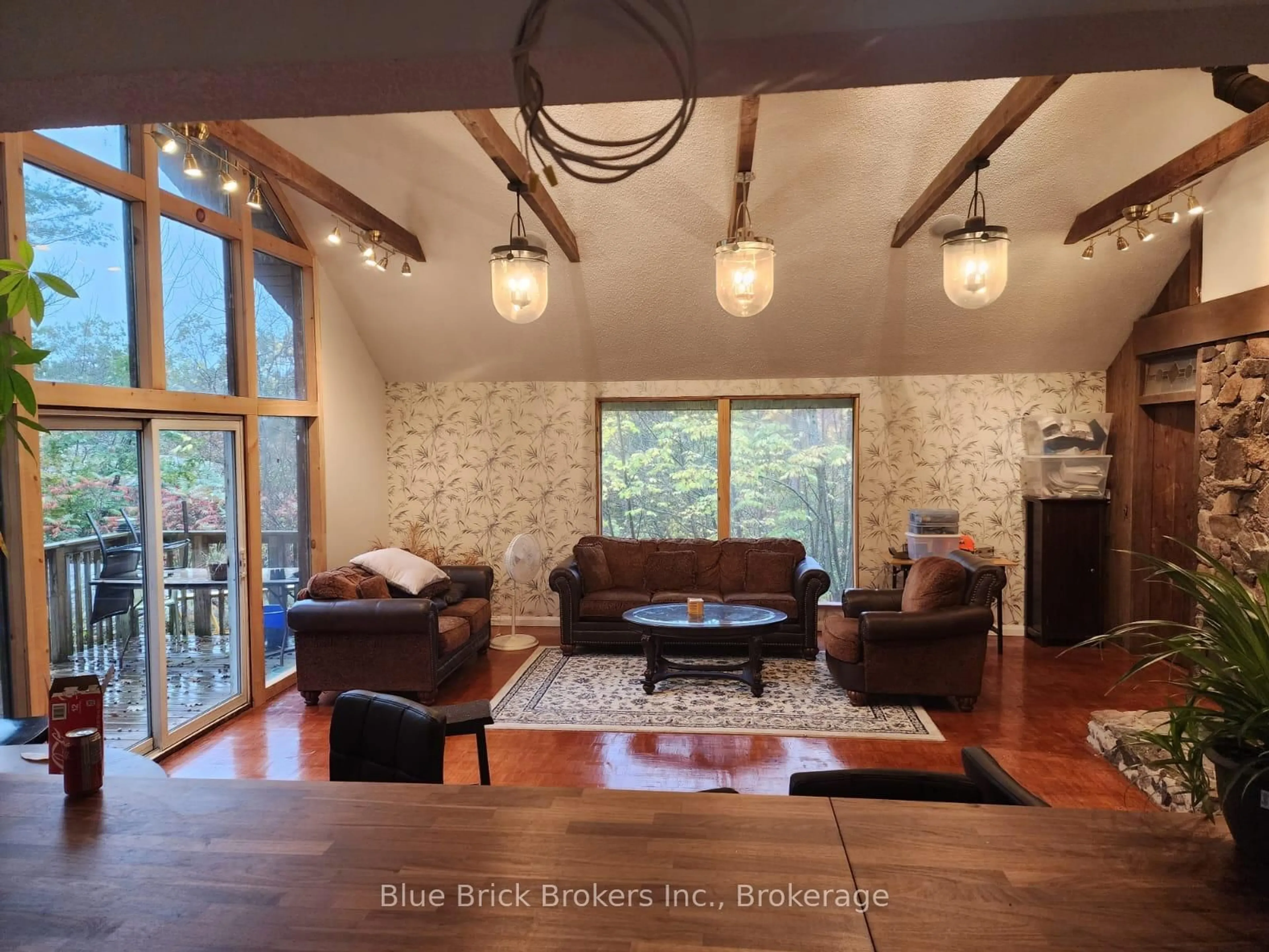 Living room with furniture, wood/laminate floor for 7813 Rama Rd, Ramara Ontario L0K 2B0