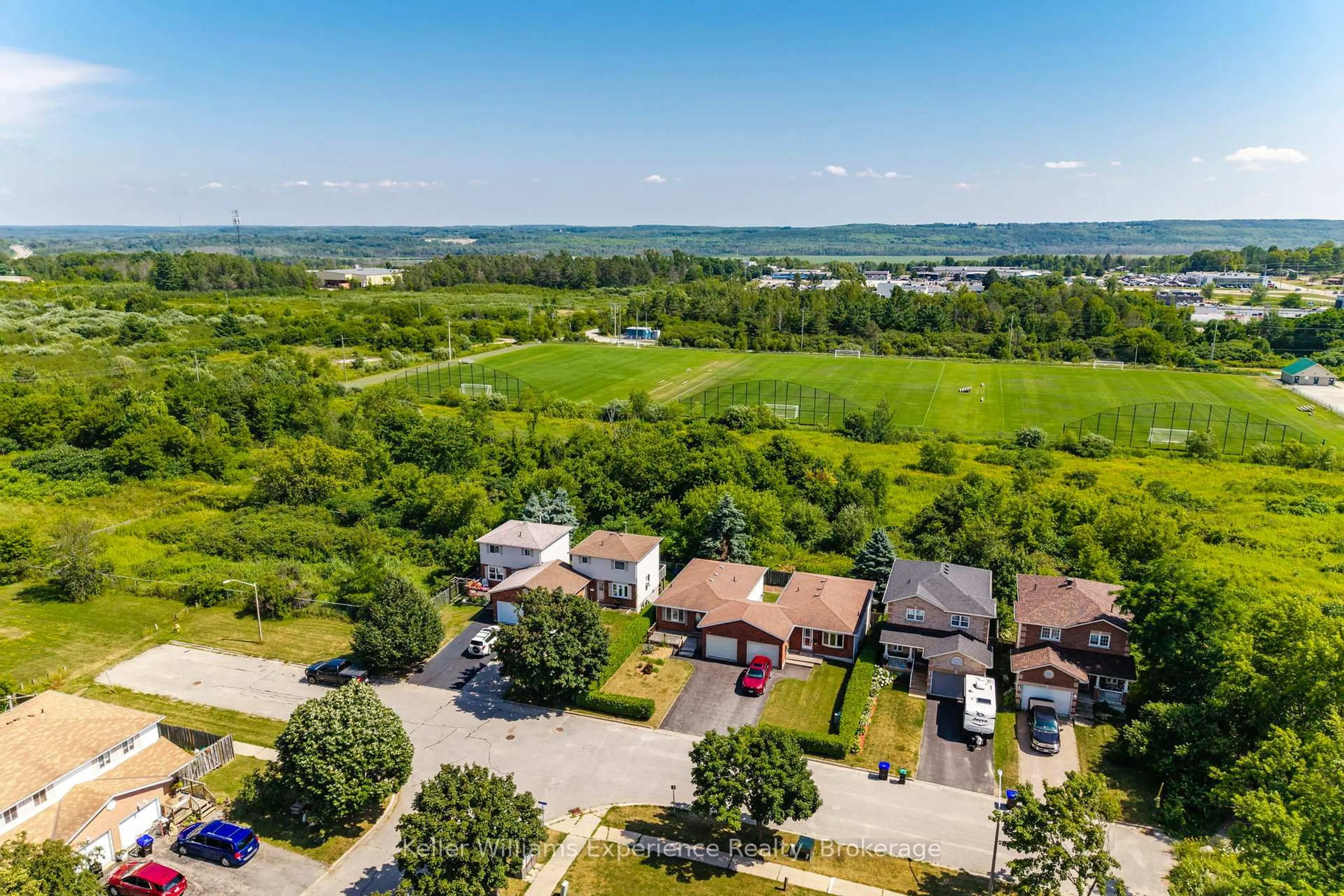 A pic from outside/outdoor area/front of a property/back of a property/a pic from drone, water/lake/river/ocean view for 369 Park Ave, Midland Ontario L4R 5C7