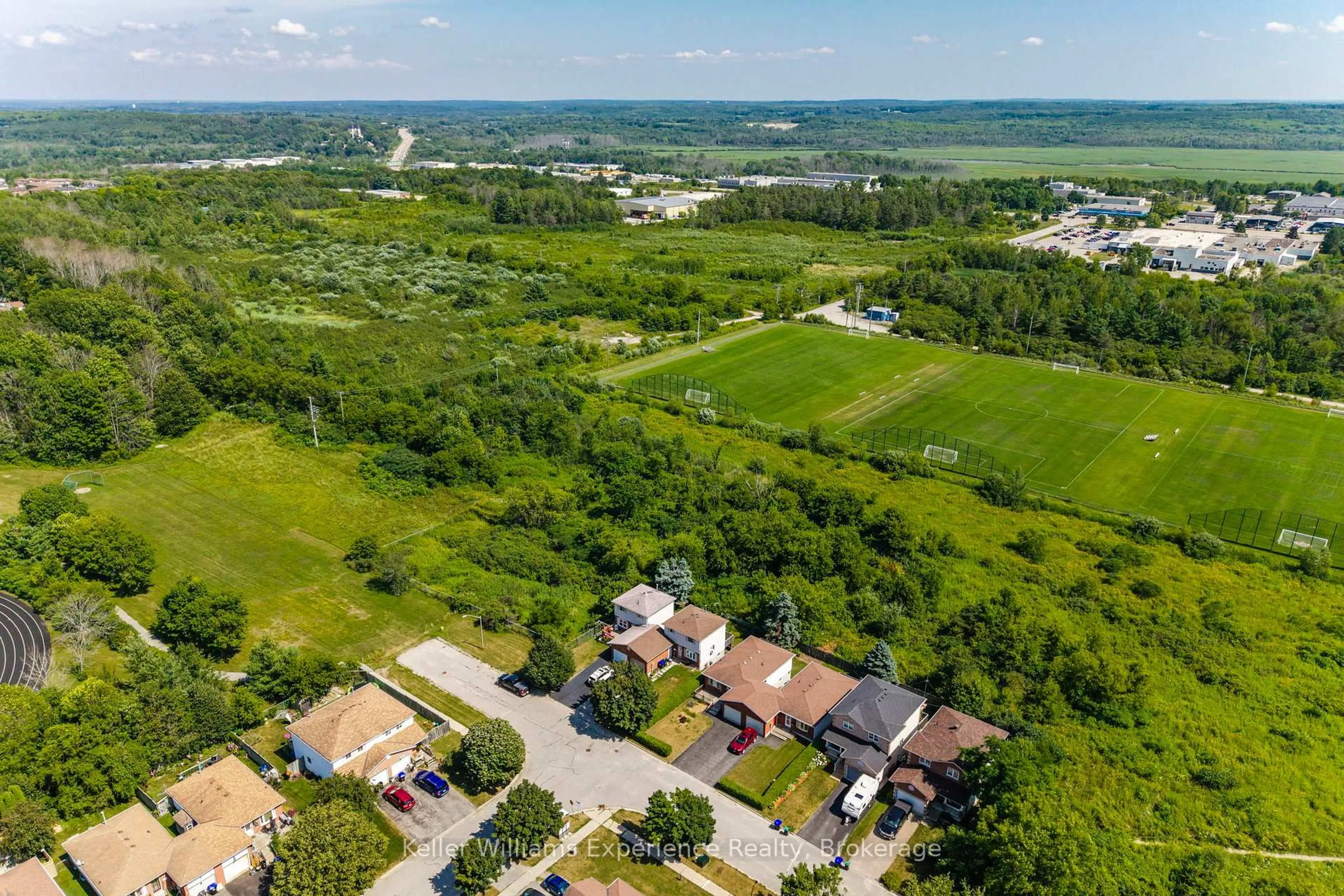 A pic from outside/outdoor area/front of a property/back of a property/a pic from drone, unknown for 369 Park Ave, Midland Ontario L4R 5C7