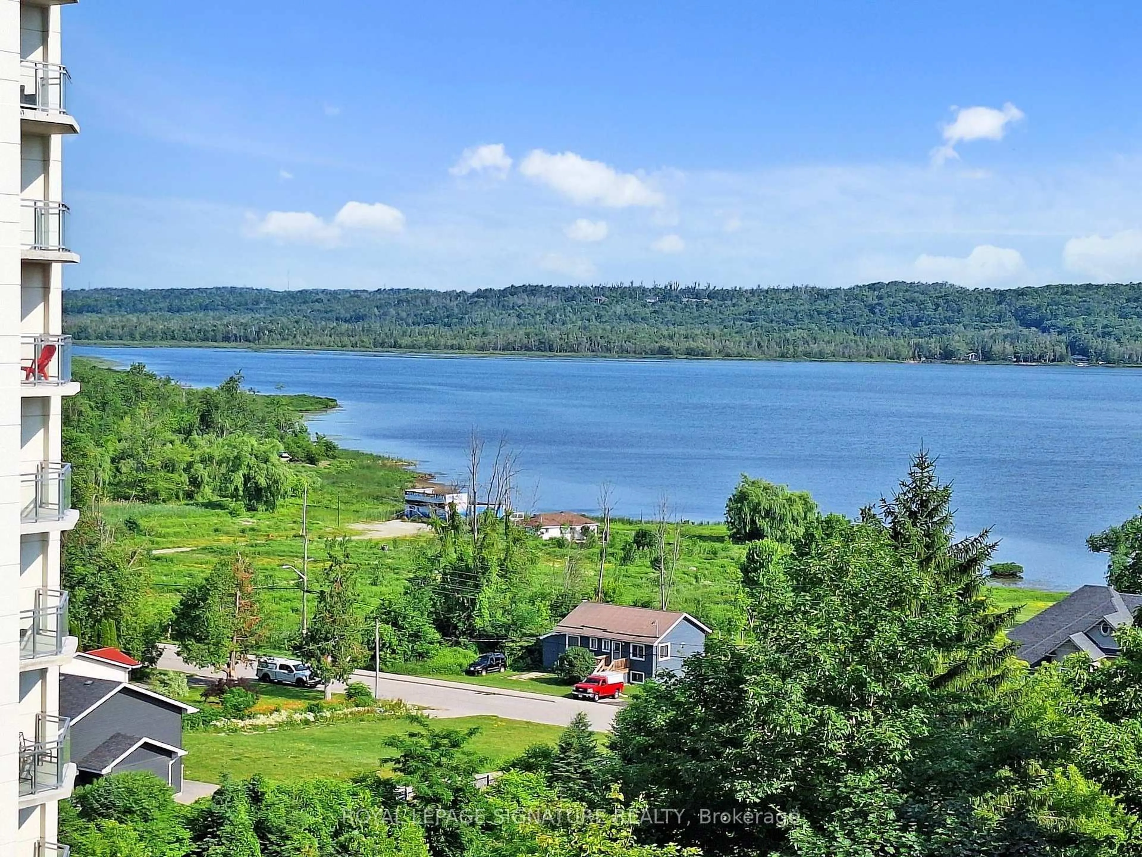 A pic from outside/outdoor area/front of a property/back of a property/a pic from drone, water/lake/river/ocean view for 58 Lakeside Terr #703, Barrie Ontario L0K 1S0