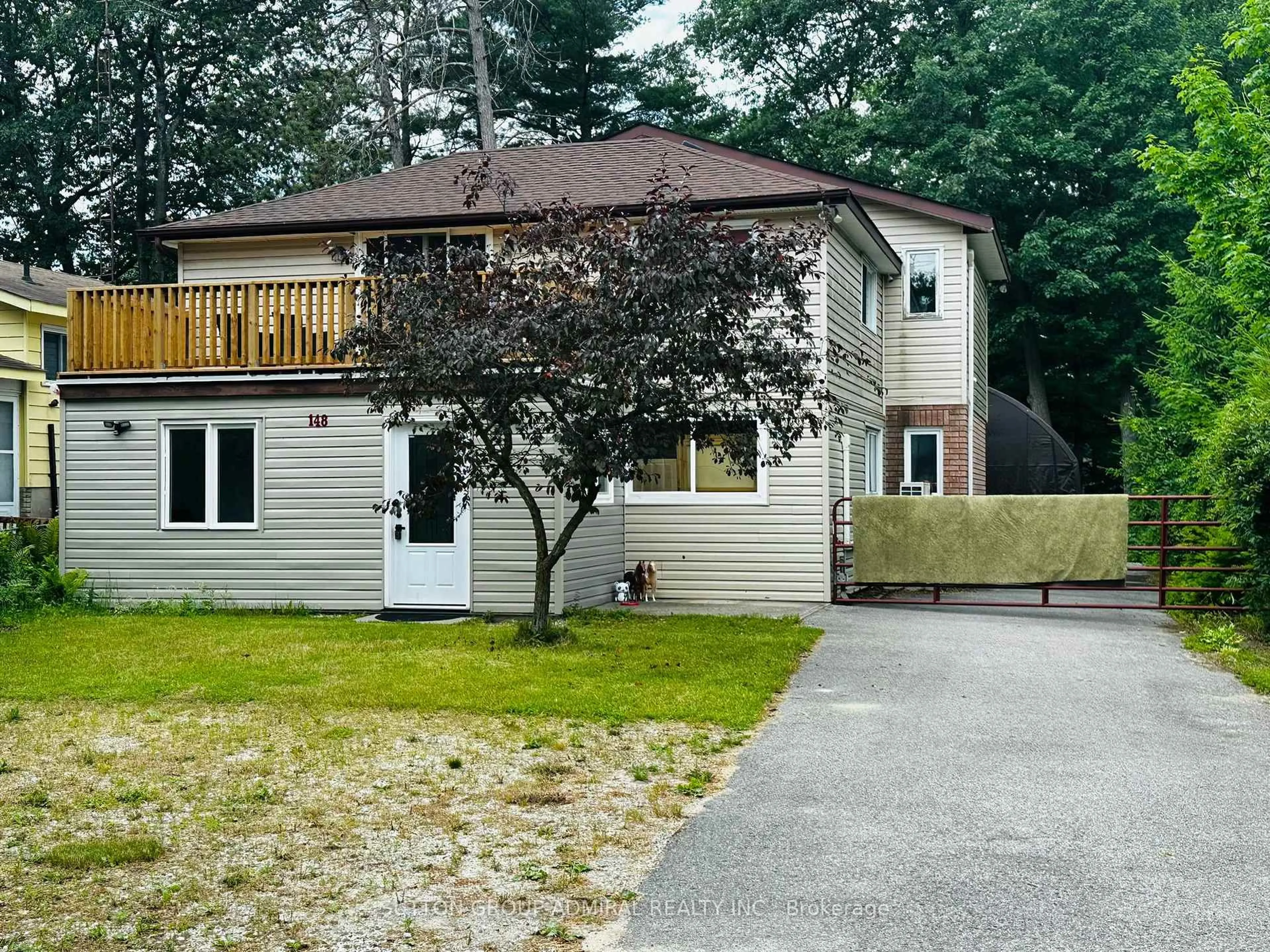 A pic from outside/outdoor area/front of a property/back of a property/a pic from drone, street for 148 Melrose Ave, Wasaga Beach Ontario L9Z 2T1