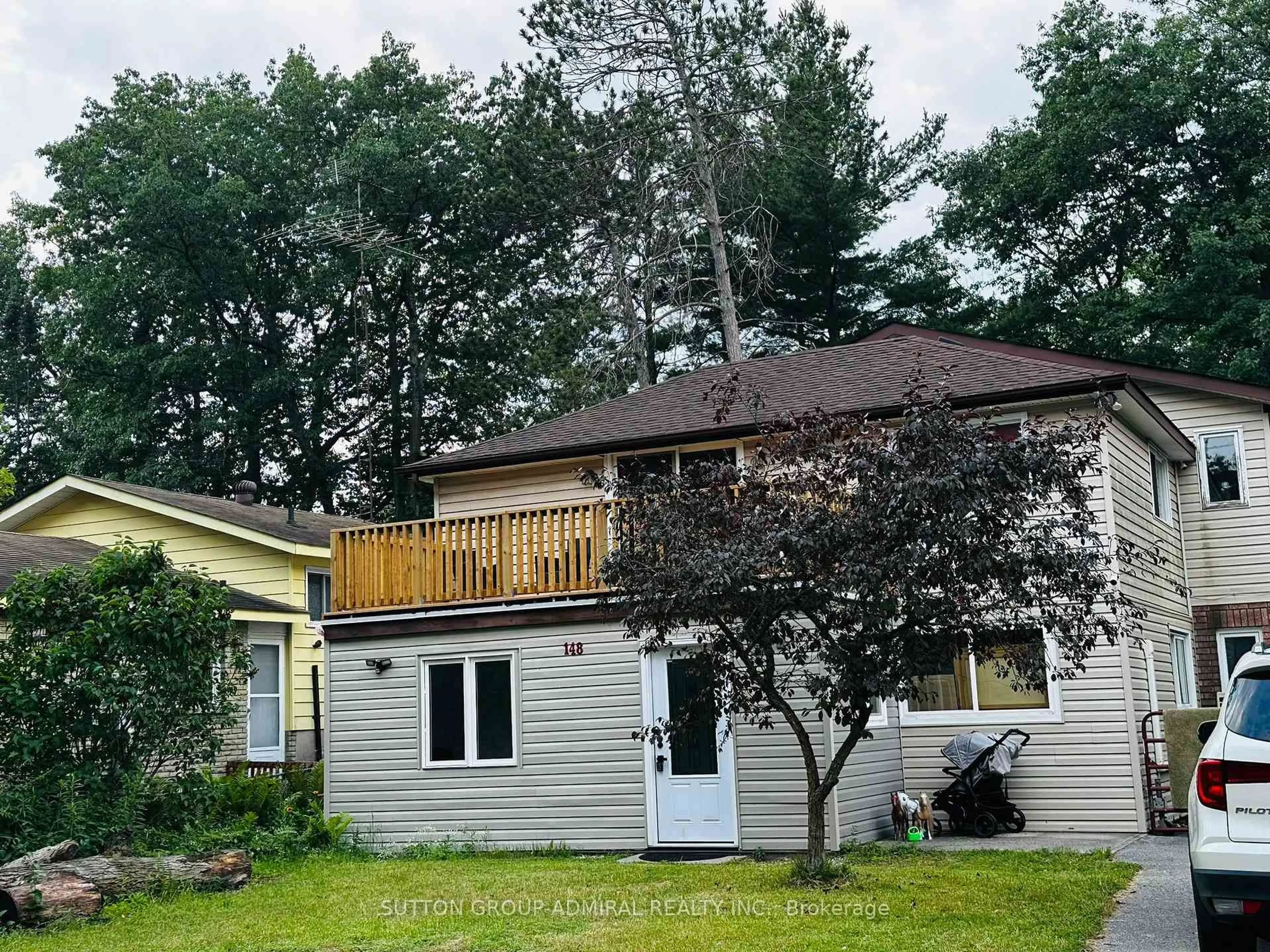 Home with vinyl exterior material, unknown for 148 Melrose Ave, Wasaga Beach Ontario L9Z 2T1