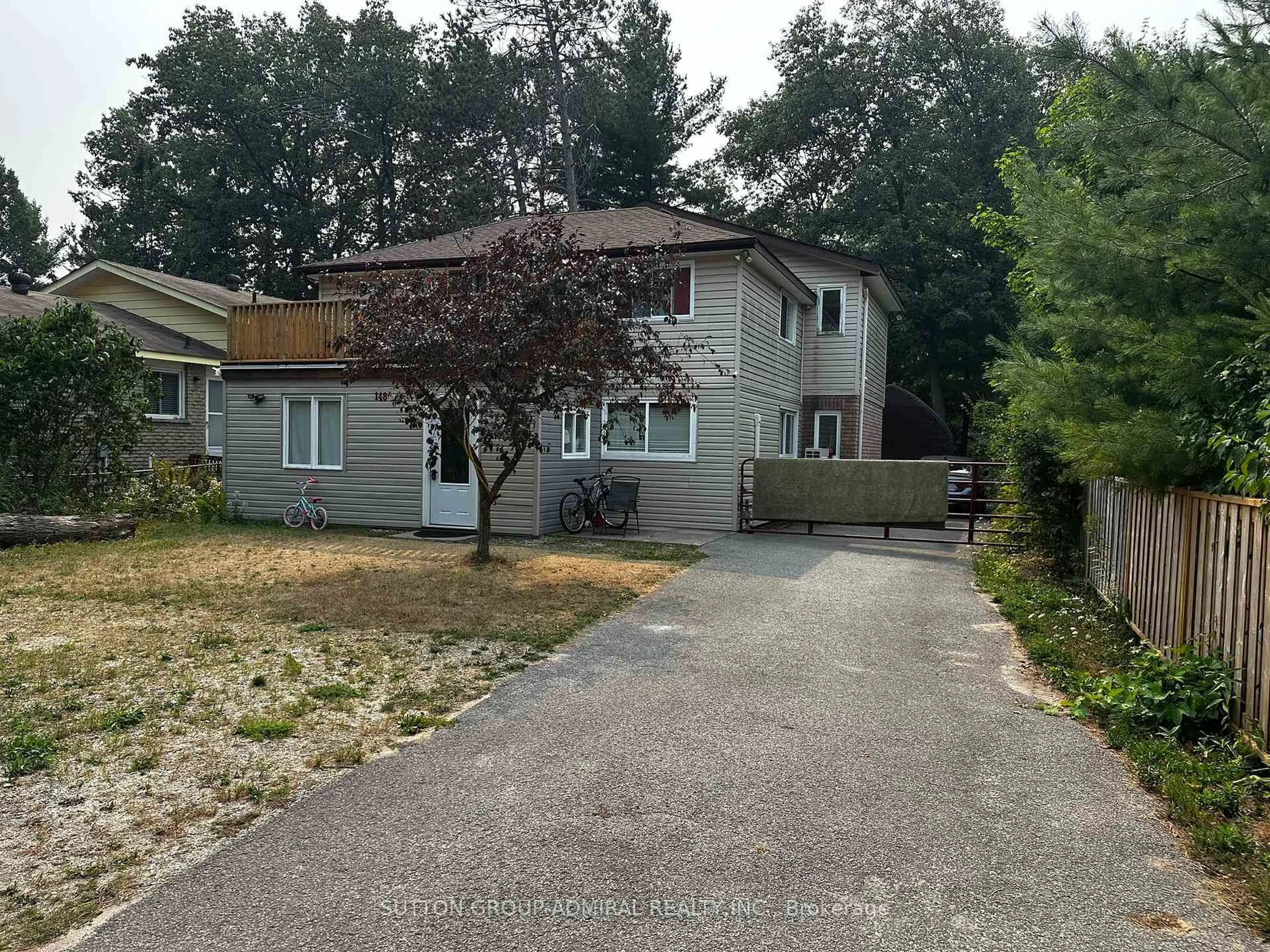A pic from outside/outdoor area/front of a property/back of a property/a pic from drone, street for 148 Melrose Ave, Wasaga Beach Ontario L9Z 2T1
