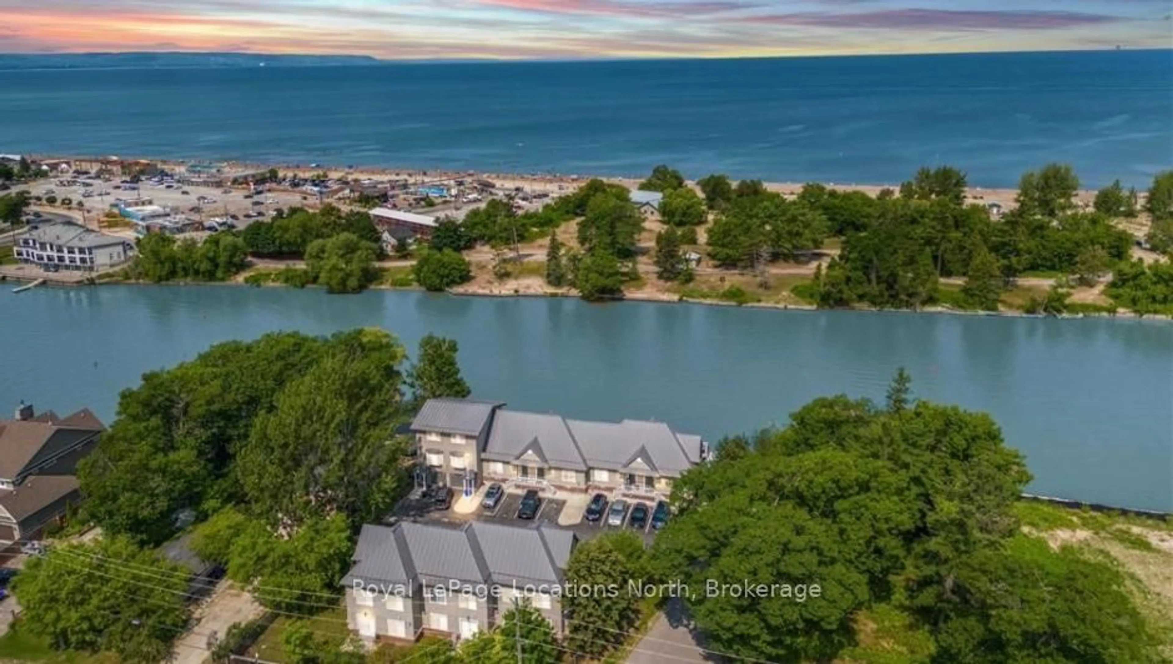 A pic from outside/outdoor area/front of a property/back of a property/a pic from drone, water/lake/river/ocean view for 64 RIVER Rd #3, Wasaga Beach Ontario L9Z 2L1