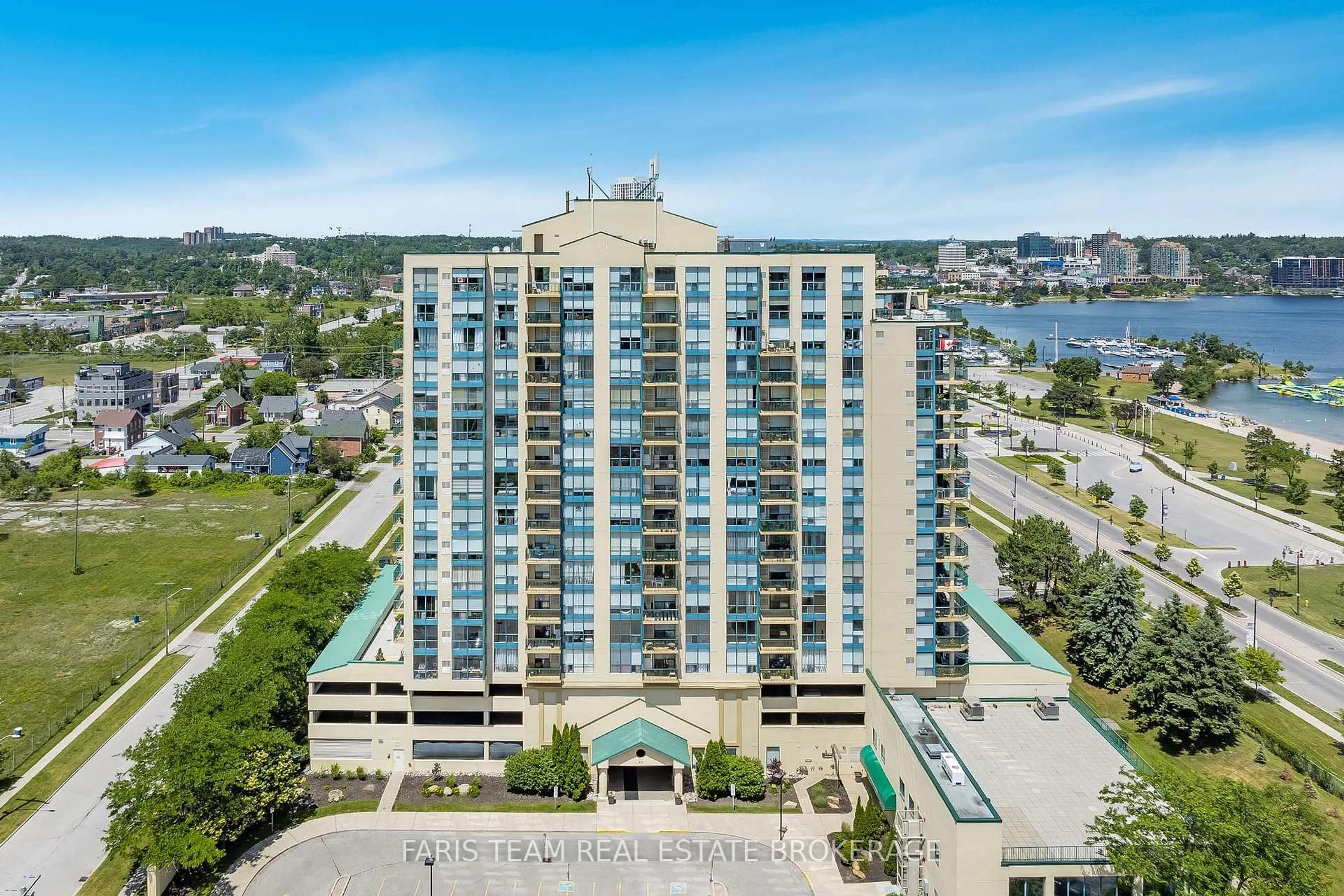 A pic from outside/outdoor area/front of a property/back of a property/a pic from drone, water/lake/river/ocean view for 65 Ellen St #1406, Barrie Ontario L4N 3A5