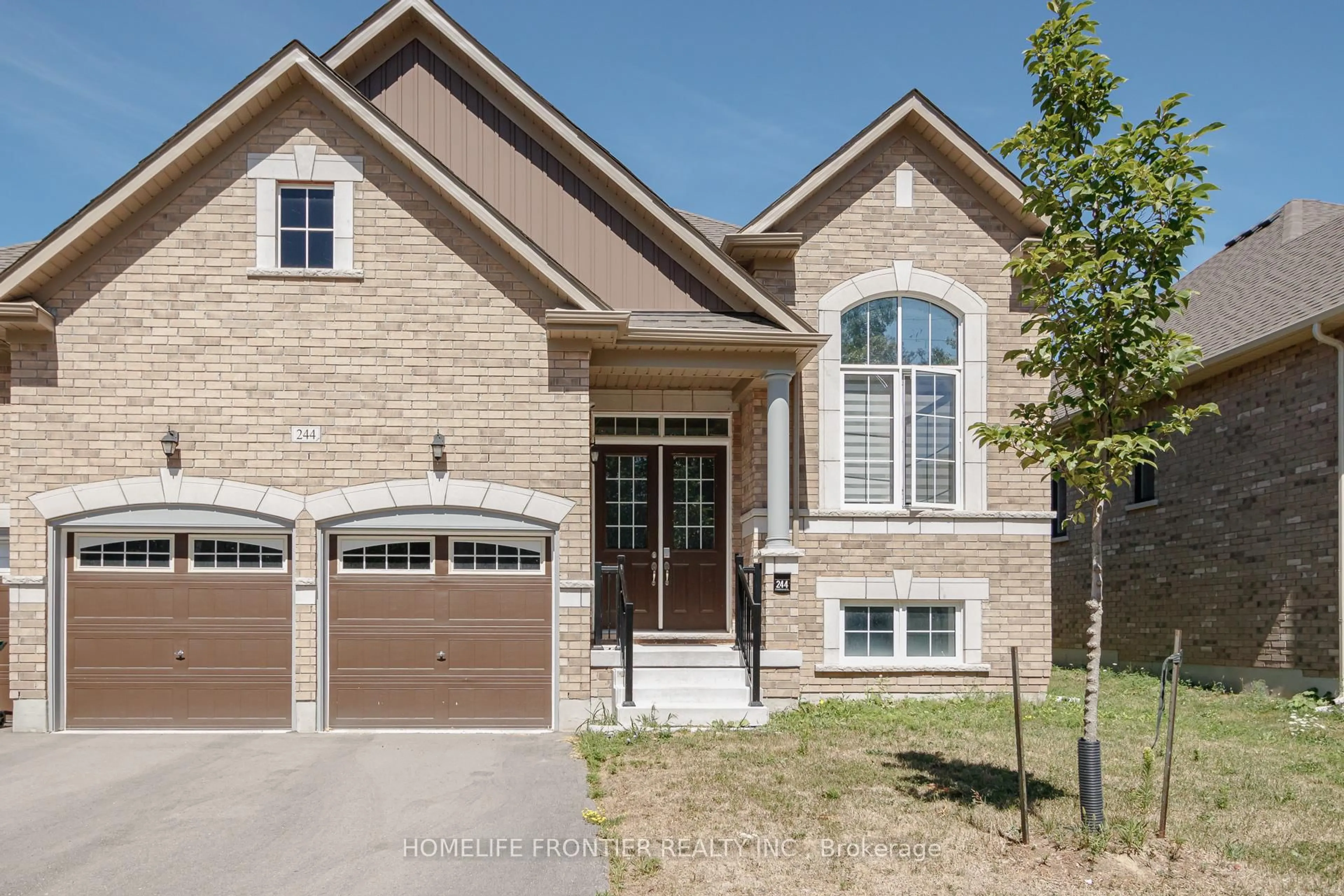 Home with brick exterior material, street for 244 Ramblewood Dr, Wasaga Beach Ontario L9Z 0L5