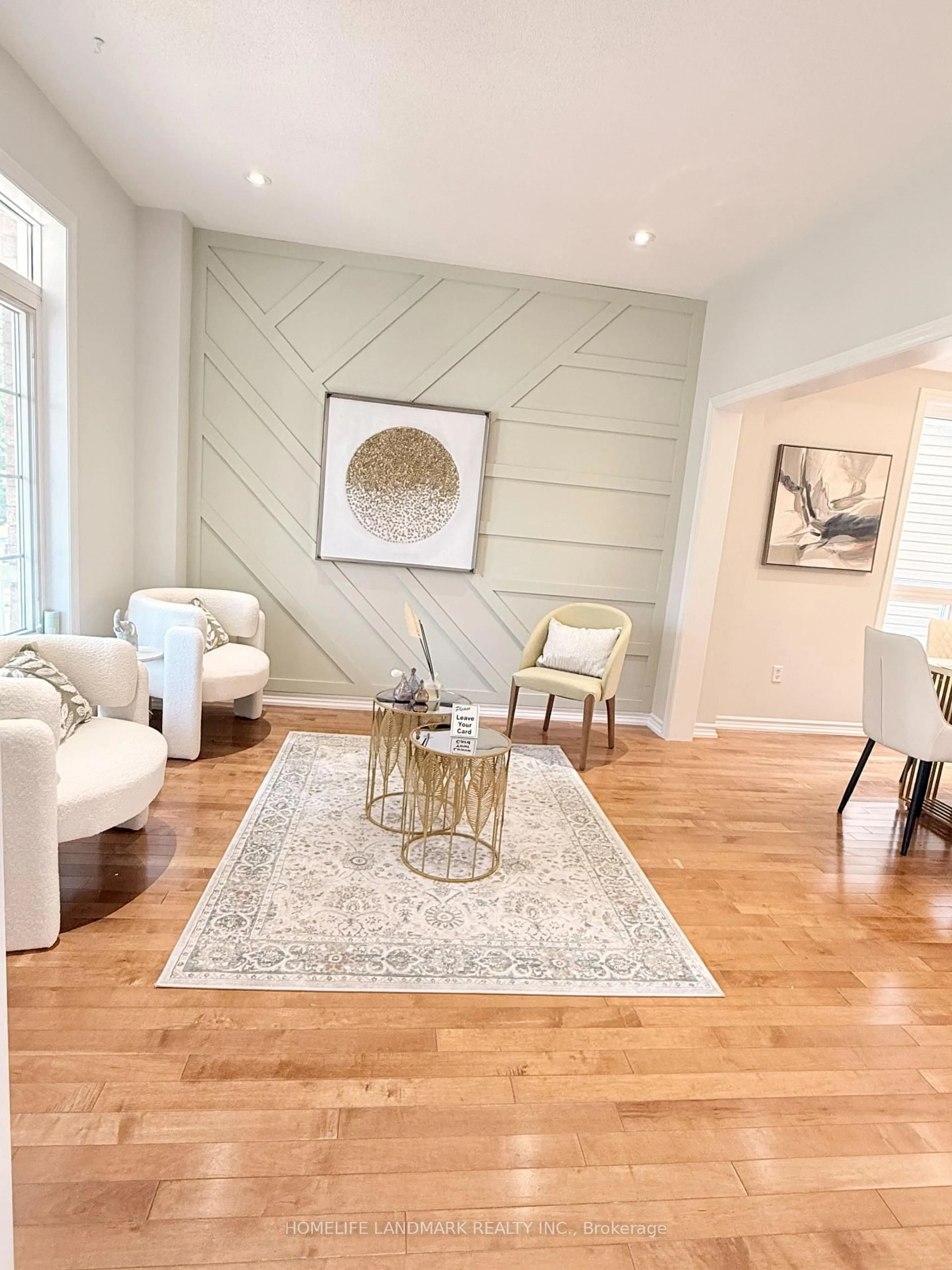 Living room with furniture, wood/laminate floor for 18 The Queensway, Barrie Ontario L4M 7H6