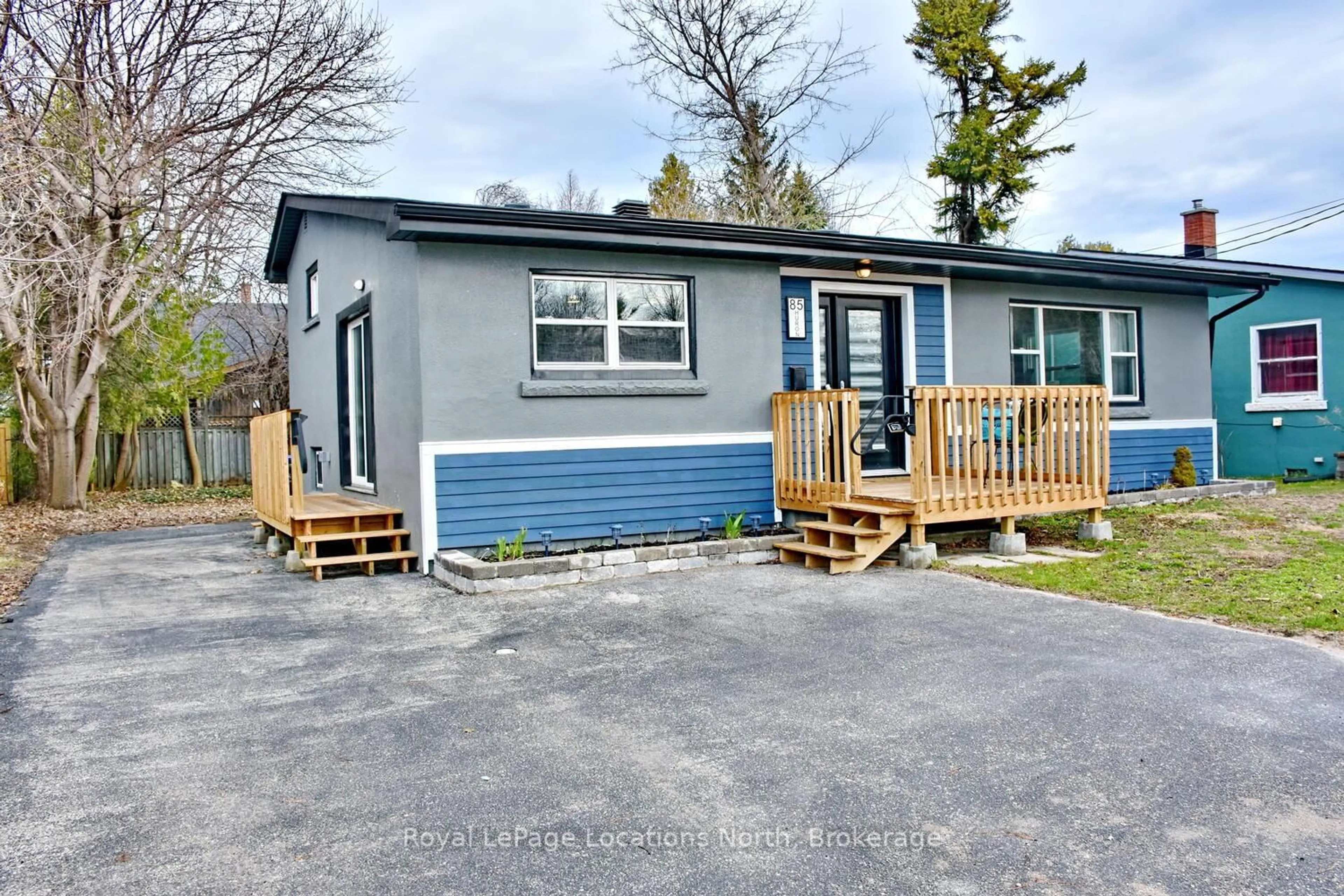 Home with vinyl exterior material, street for 85 Huron St, Collingwood Ontario L9Y 1C7