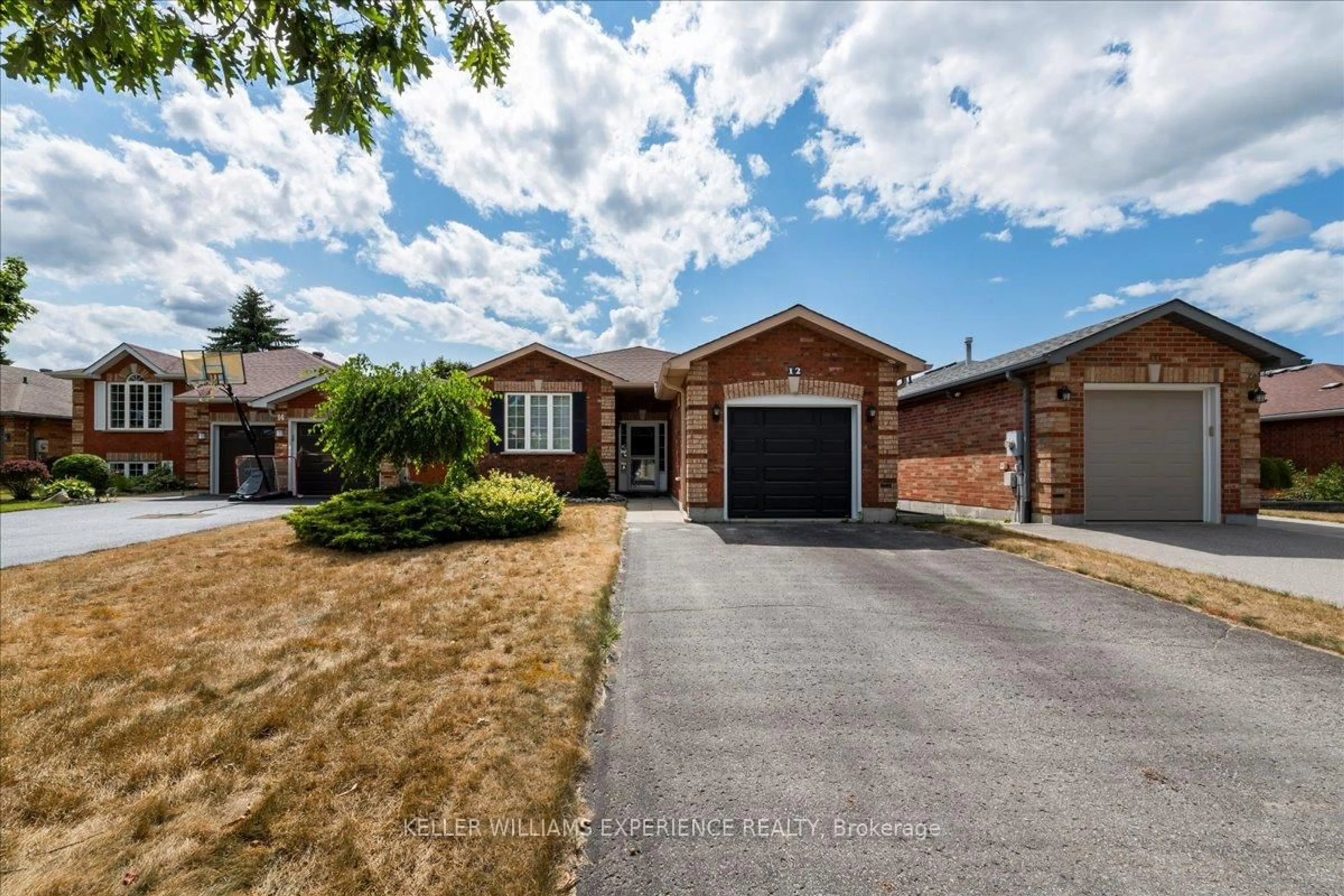 Home with brick exterior material, street for 12 Revelstoke Crt, Barrie Ontario L4N 8X7