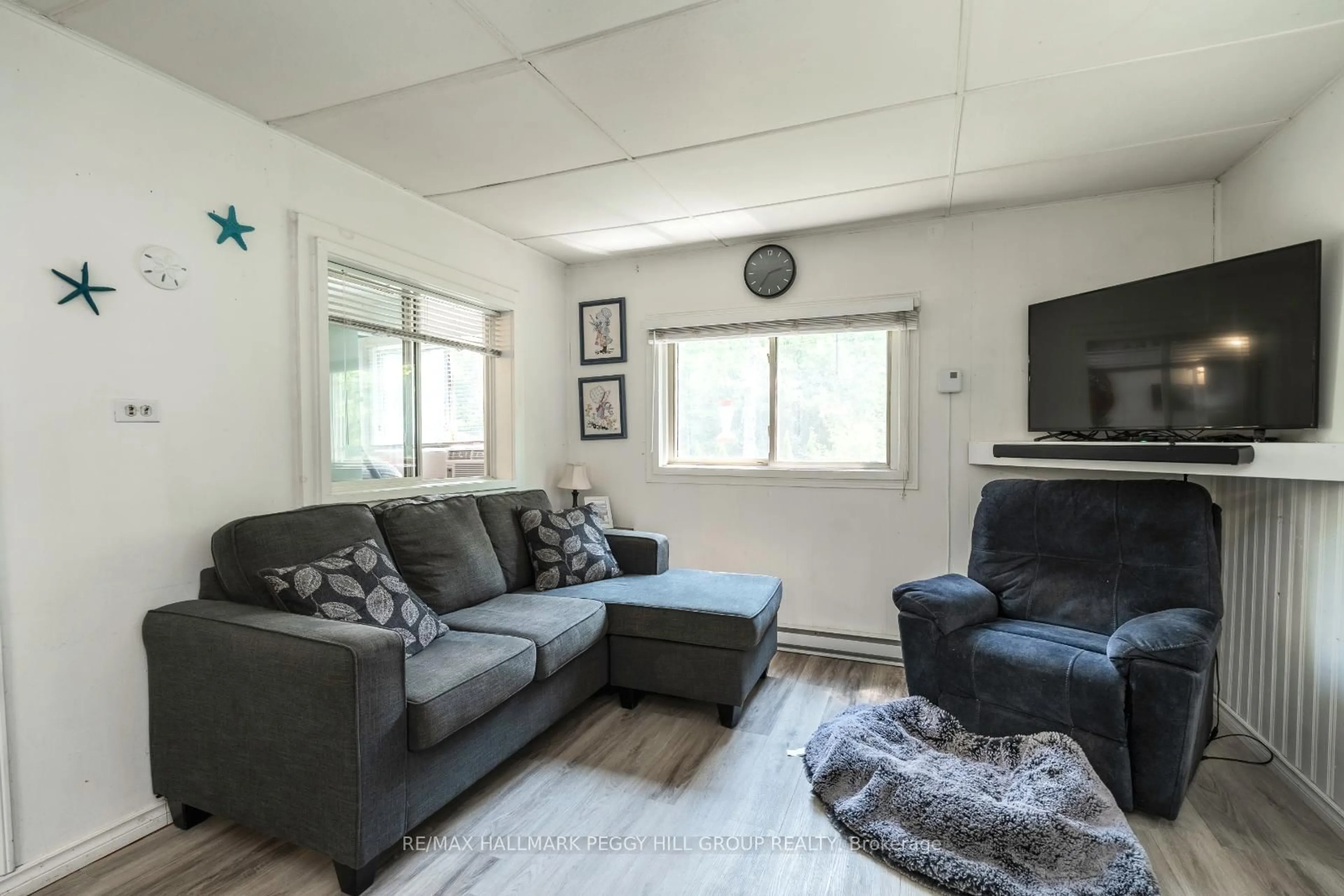 Living room with furniture, unknown for 28 Wozniak Rd, Penetanguishene Ontario L9M 1W5