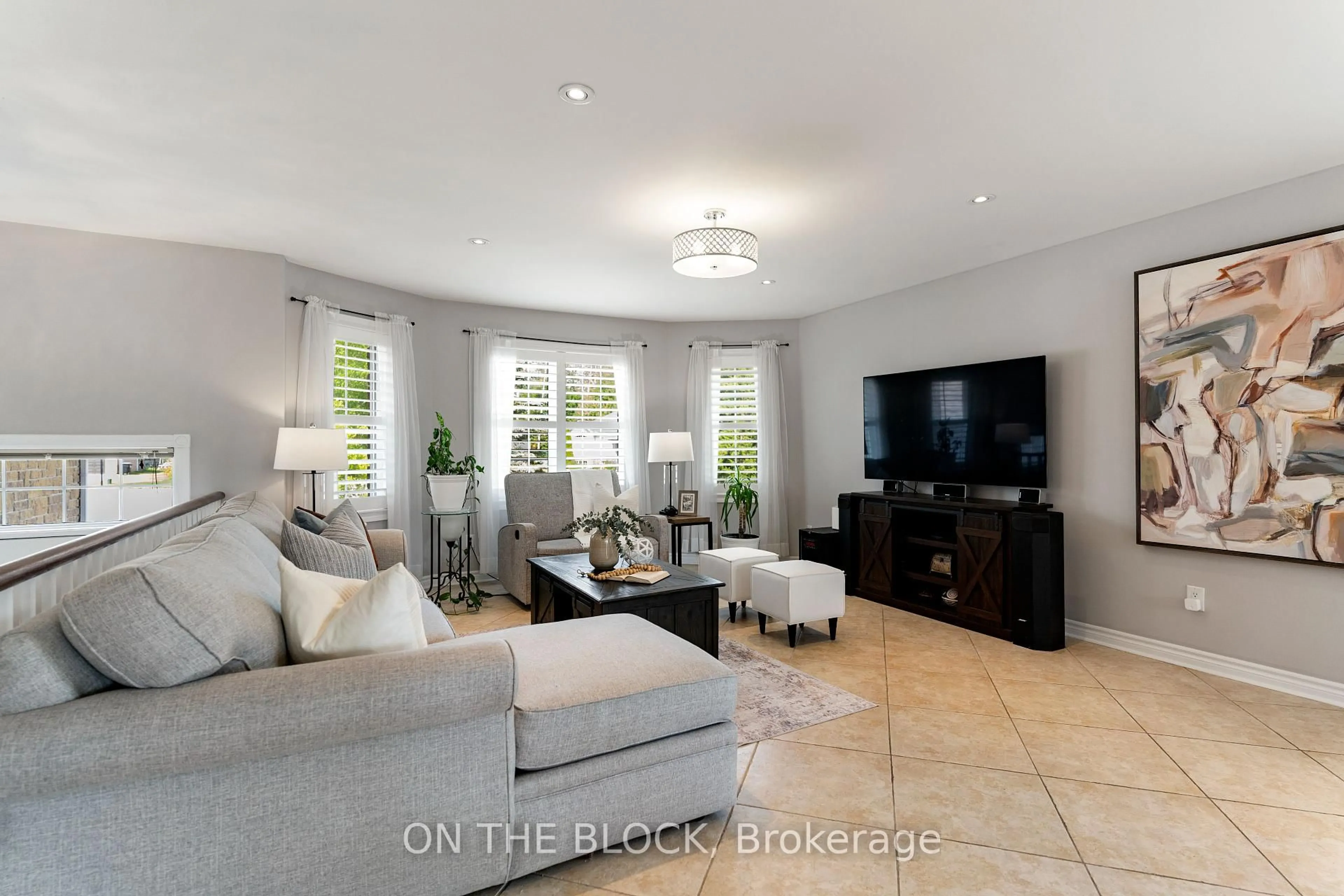 Living room with furniture, ceramic/tile floor for 66 Donato Way, Wasaga Beach Ontario L9Z 1R9