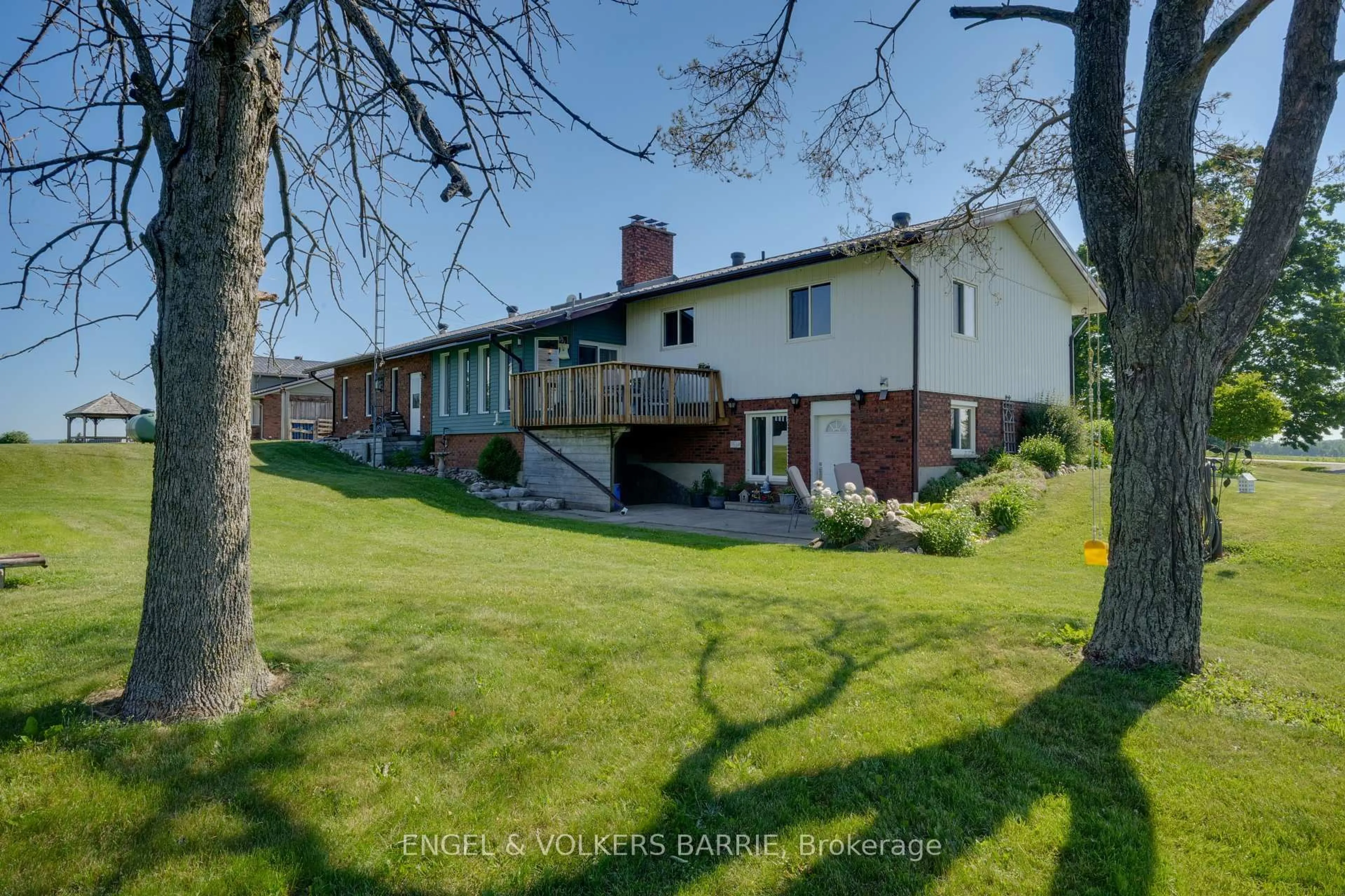 A pic from outside/outdoor area/front of a property/back of a property/a pic from drone, street for 558 1 Line, Oro-Medonte Ontario L0L 2L0