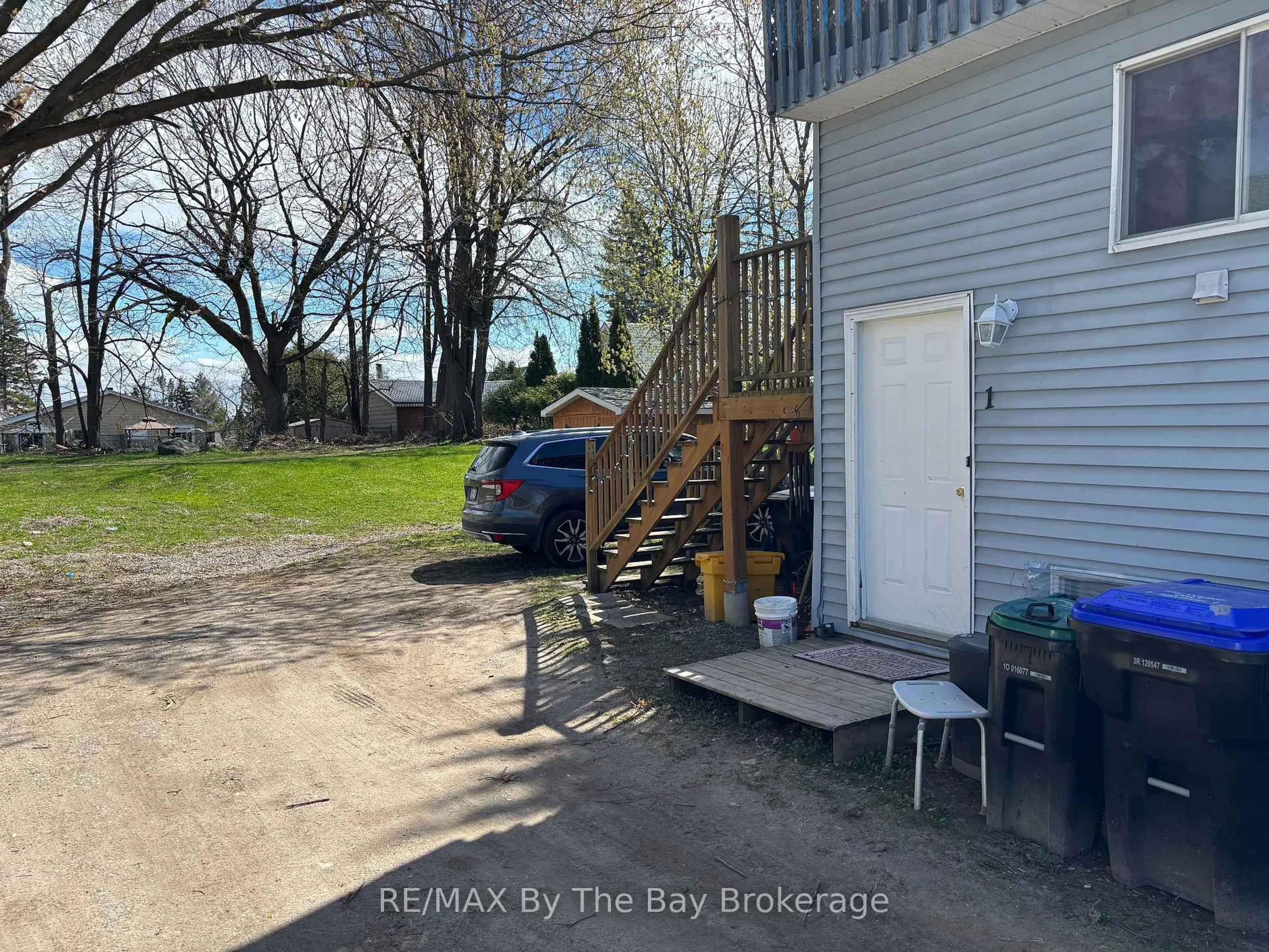A pic from outside/outdoor area/front of a property/back of a property/a pic from drone, water/lake/river/ocean view for 203 George St, Midland Ontario L4R 2W3