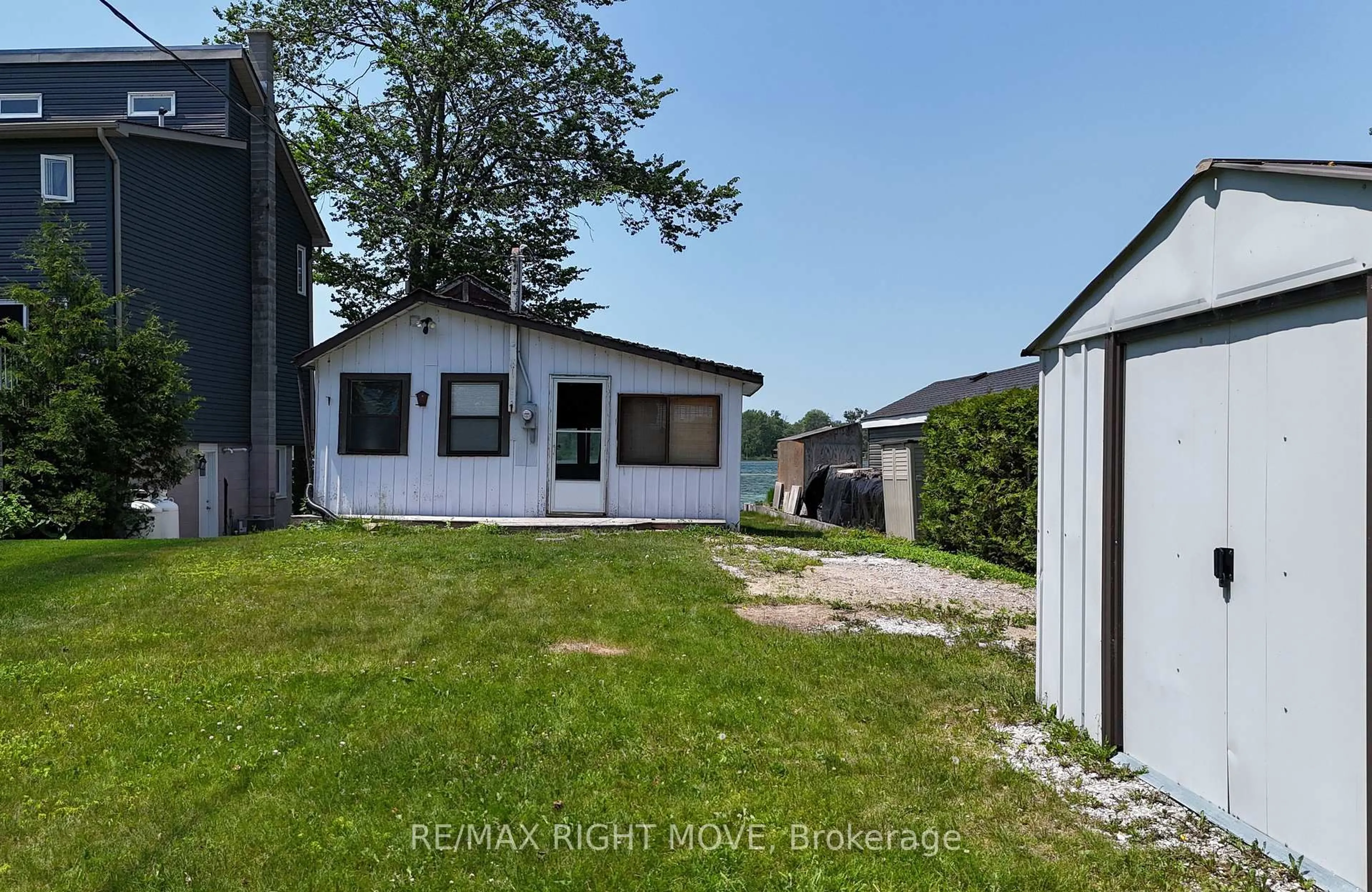A pic from outside/outdoor area/front of a property/back of a property/a pic from drone, unknown for 7682 Oak Point Rd, Ramara Ontario L0K 2B0