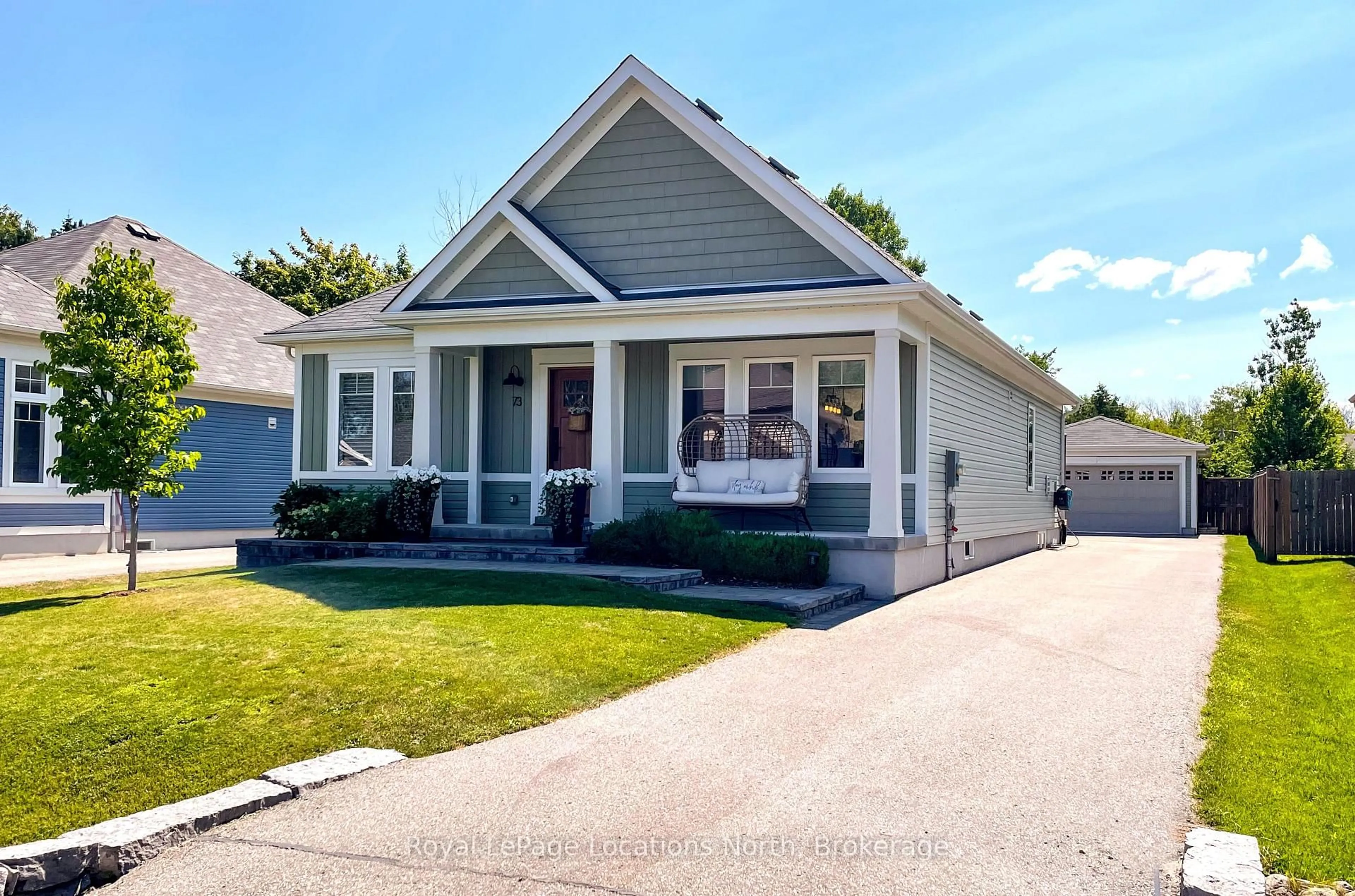 Home with vinyl exterior material, street for 73 Marilyn Ave, Wasaga Beach Ontario L9Z 2Y1