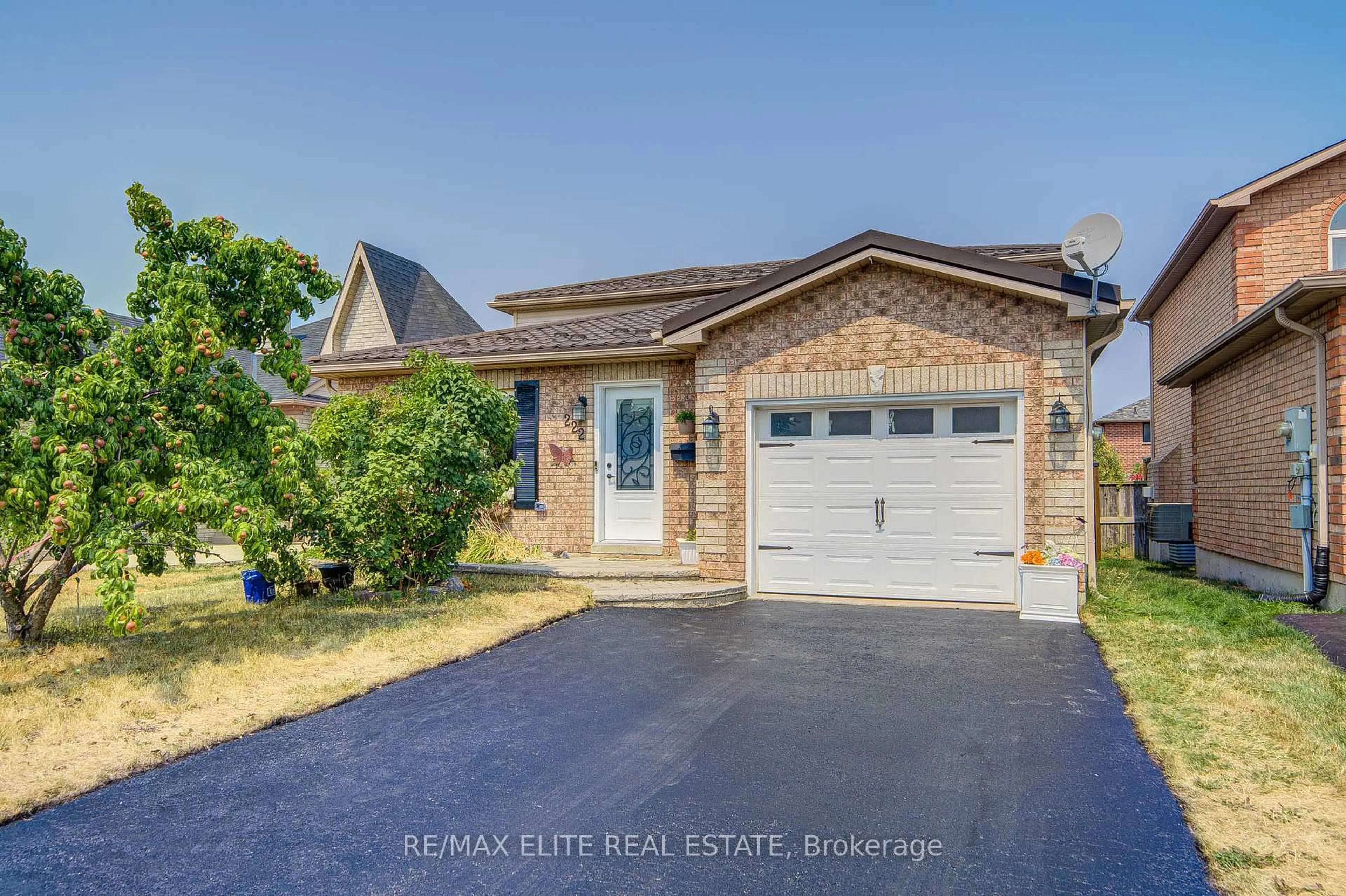 Home with brick exterior material, street for 222 Country Lane, Barrie Ontario L4N 0W1