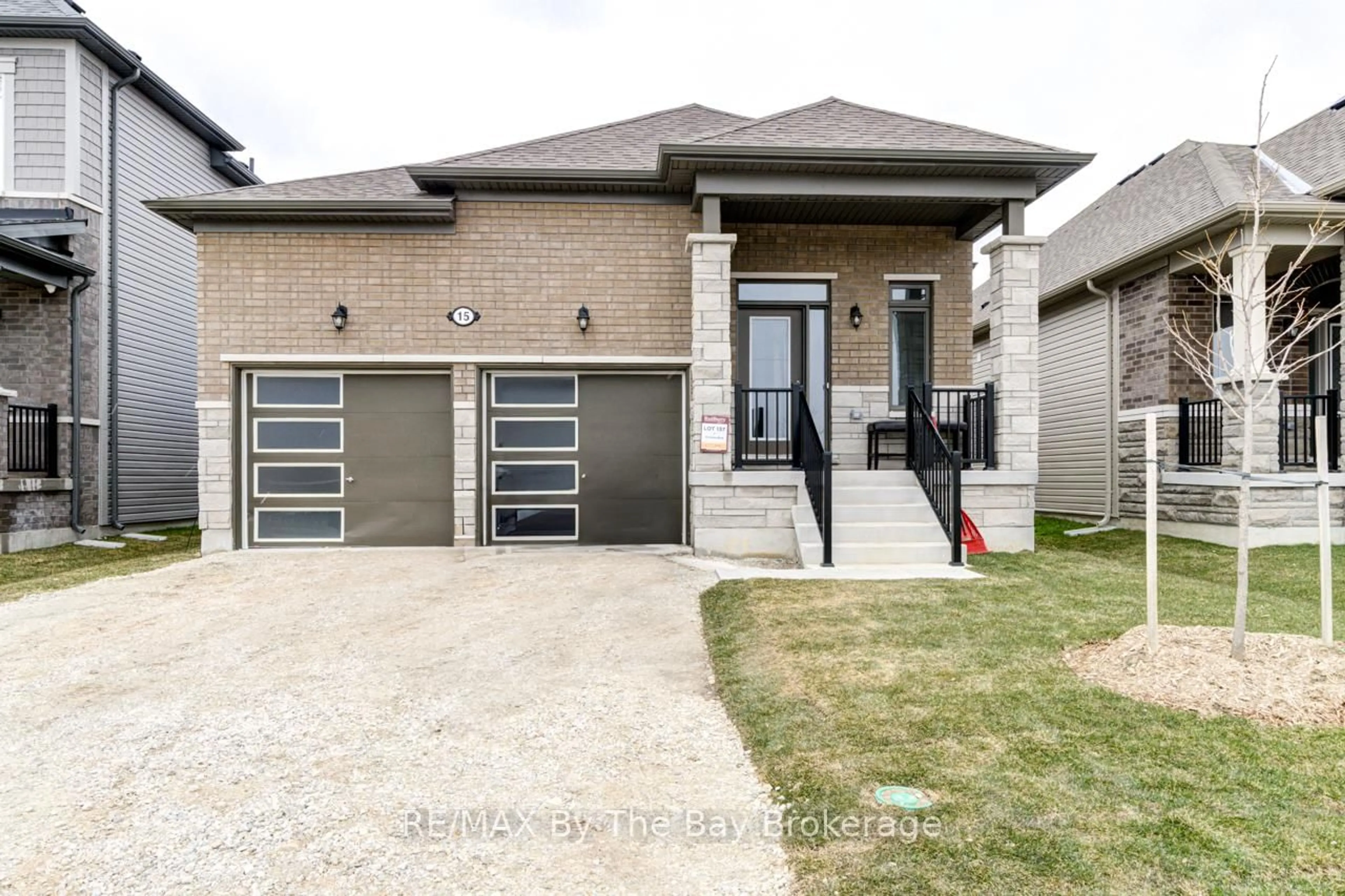 Home with brick exterior material, street for 15 Union Blvd, Wasaga Beach Ontario L9Z 0M6