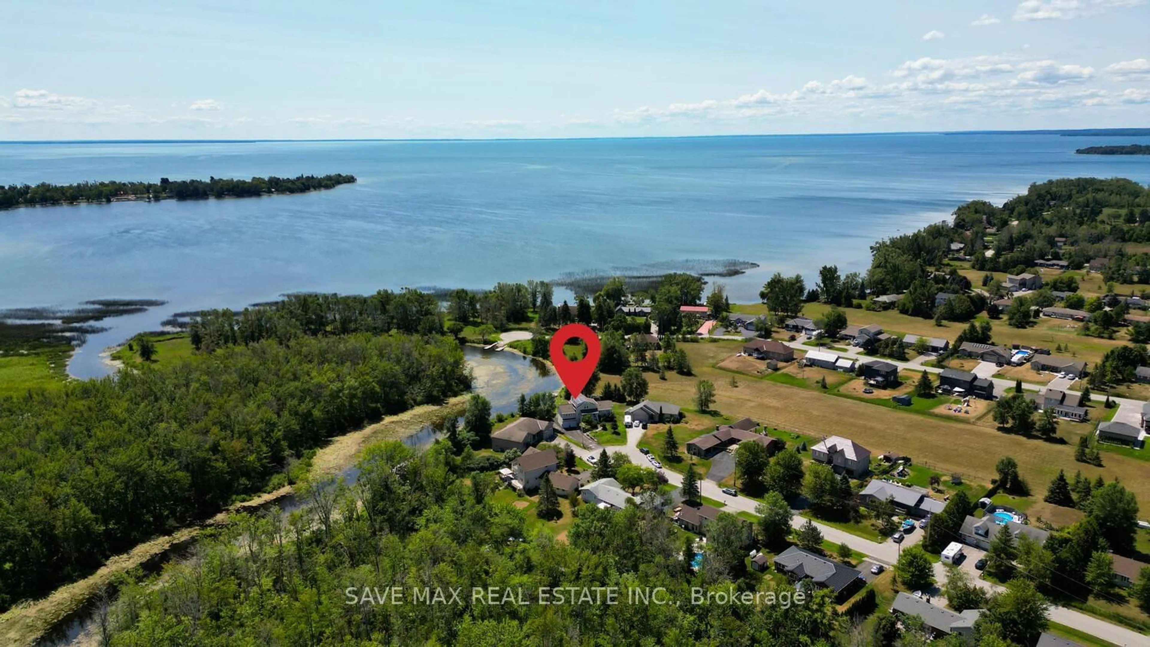 A pic from outside/outdoor area/front of a property/back of a property/a pic from drone, water/lake/river/ocean view for 3786 Leo Cres, Ramara Ontario L3V 6H7