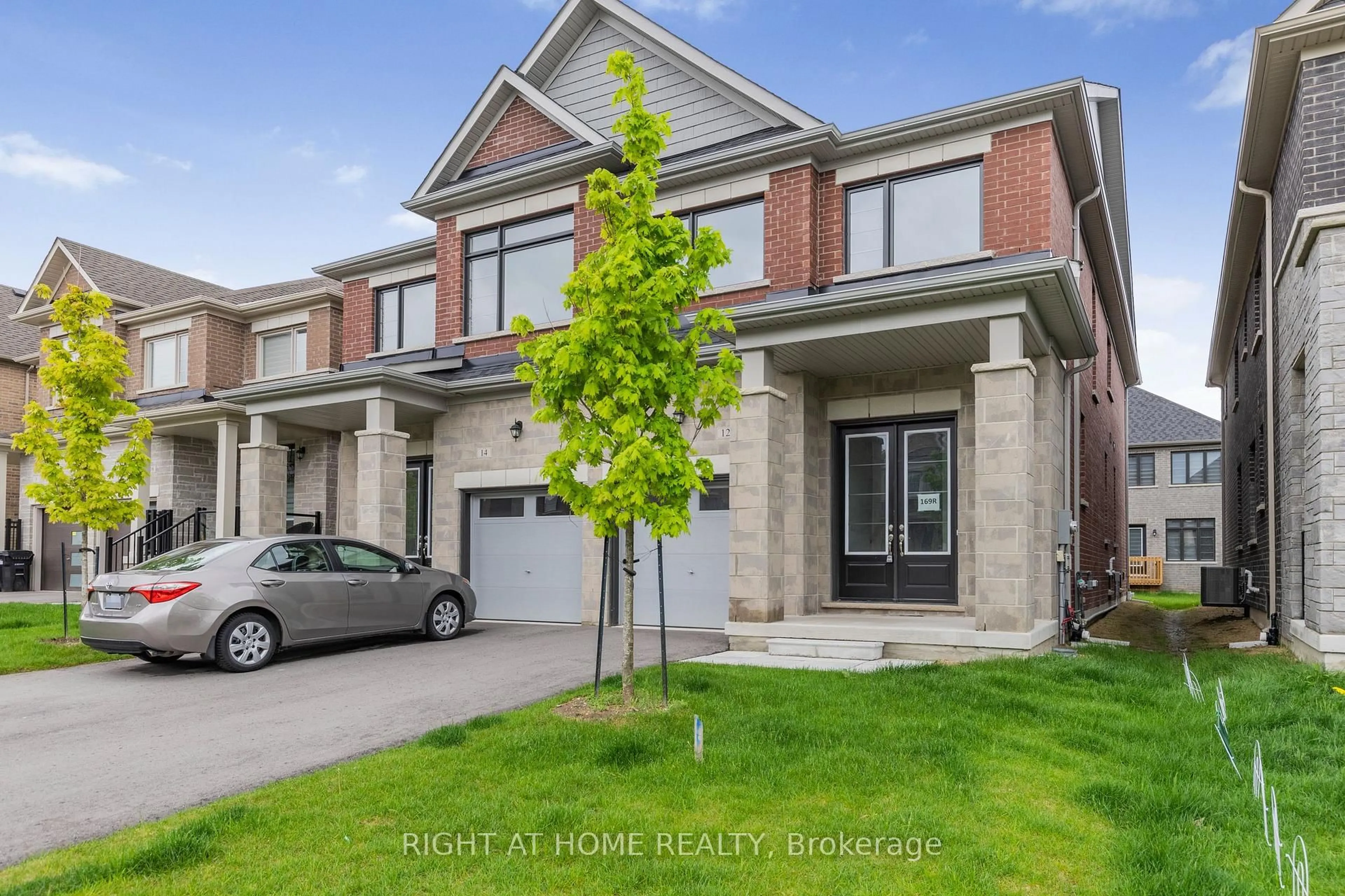 Home with brick exterior material, street for 12 Sassafras Rd, Springwater Ontario L0L 1Y3