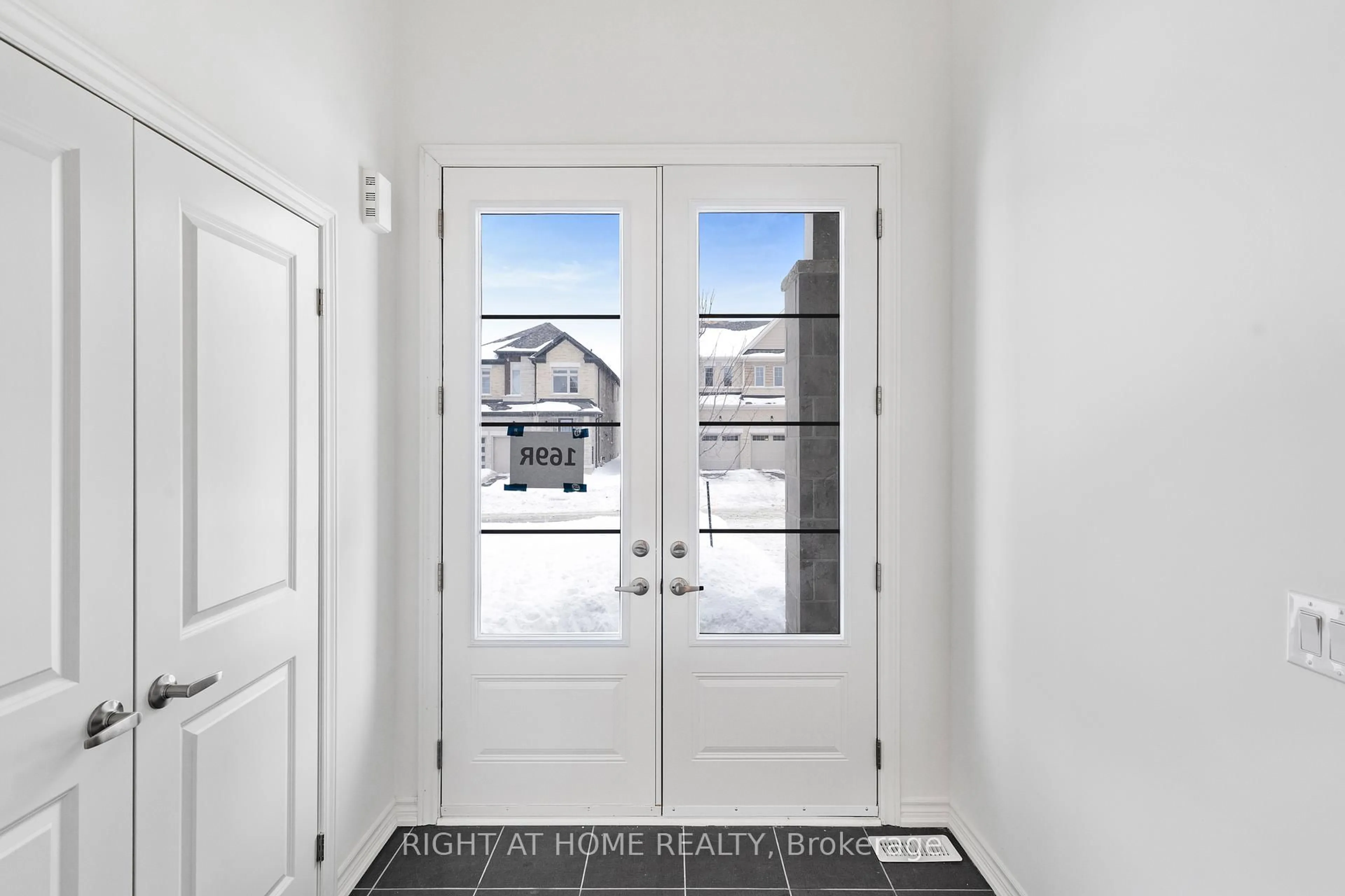 Indoor entryway for 12 Sassafras Rd, Springwater Ontario L0L 1Y3