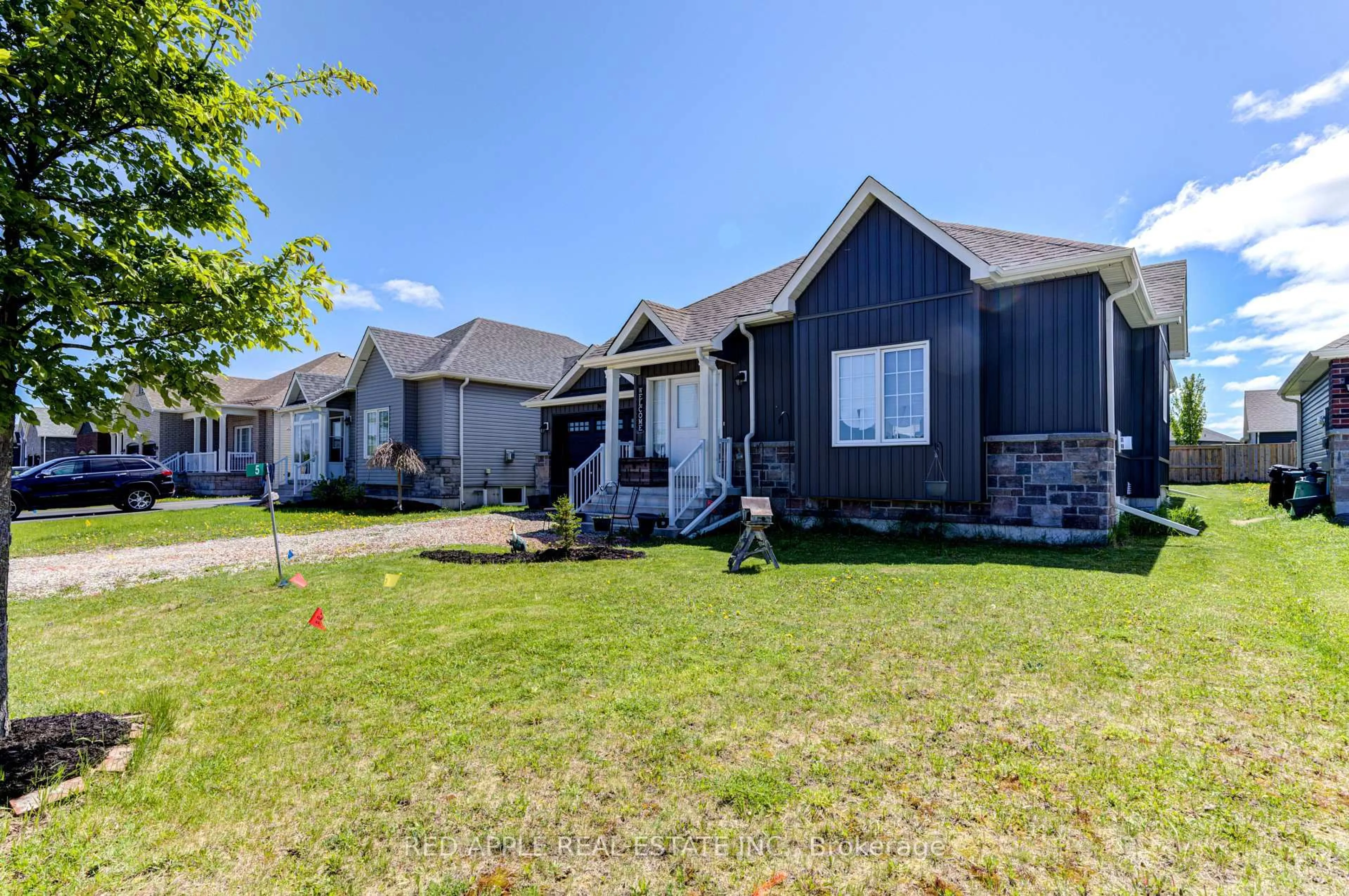 A pic from outside/outdoor area/front of a property/back of a property/a pic from drone, street for 5 Beverly St, Springwater Ontario L0L 1P0