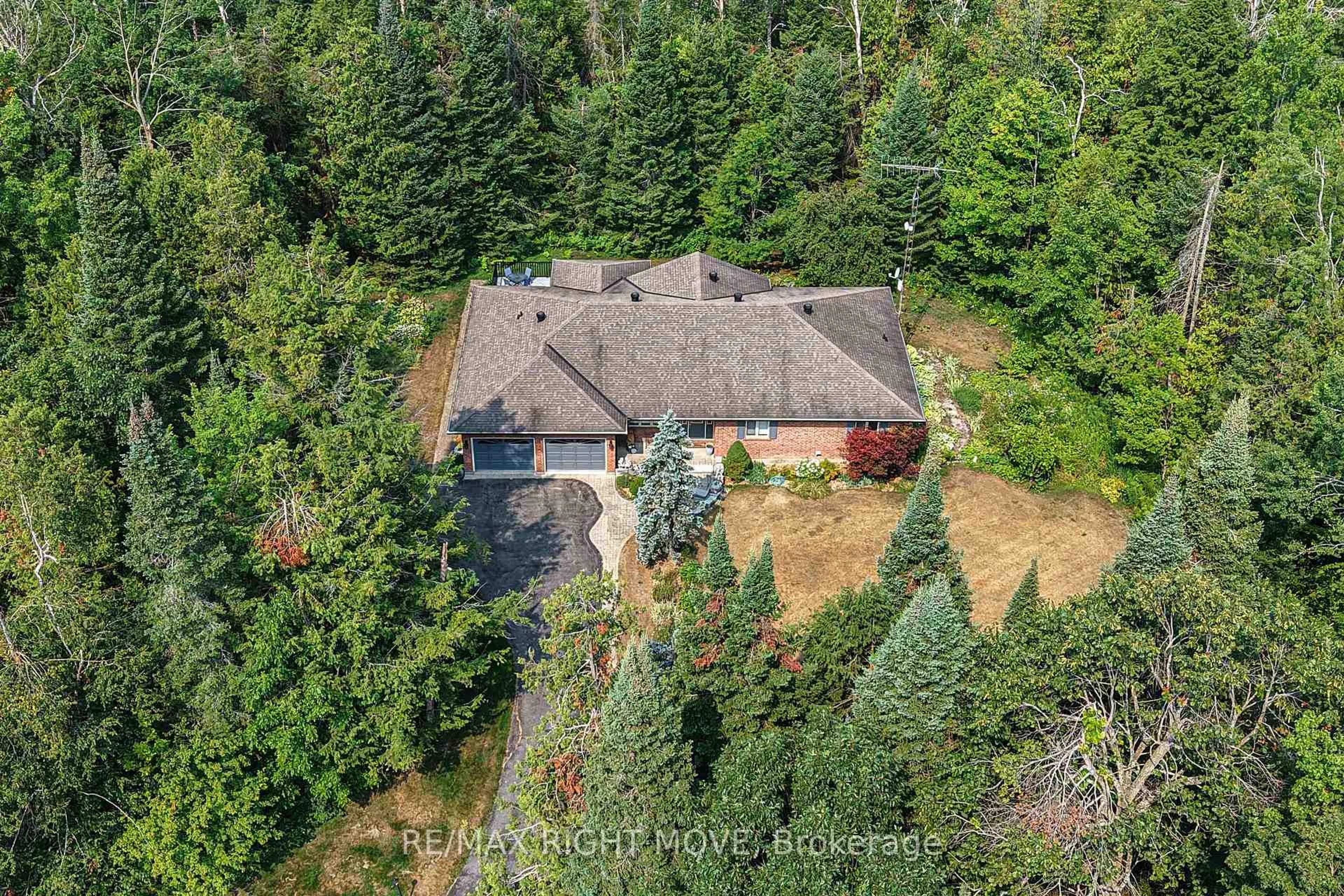 A pic from outside/outdoor area/front of a property/back of a property/a pic from drone, forest/trees view for 1892 CARRIAGE Crt, Severn Ontario L3V 6H2