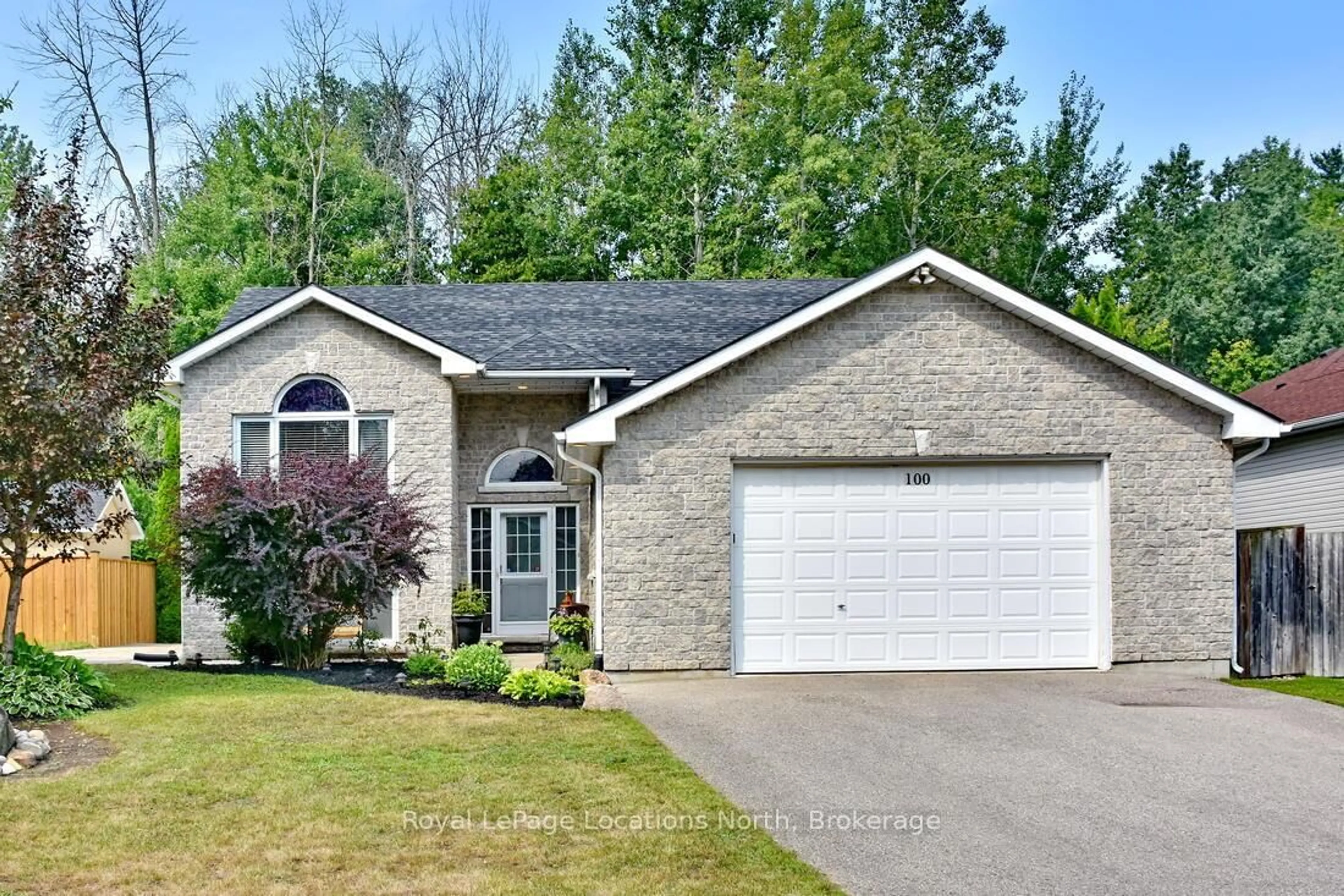 Home with brick exterior material, street for 100 62ND St, Wasaga Beach Ontario L9Z 2Z4